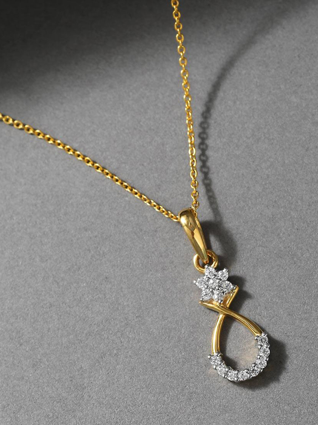 

CANDERE A KALYAN JEWELLERS COMPANY Cubic Zirconia-Studded 18KT Gold Pendant-1.31gm