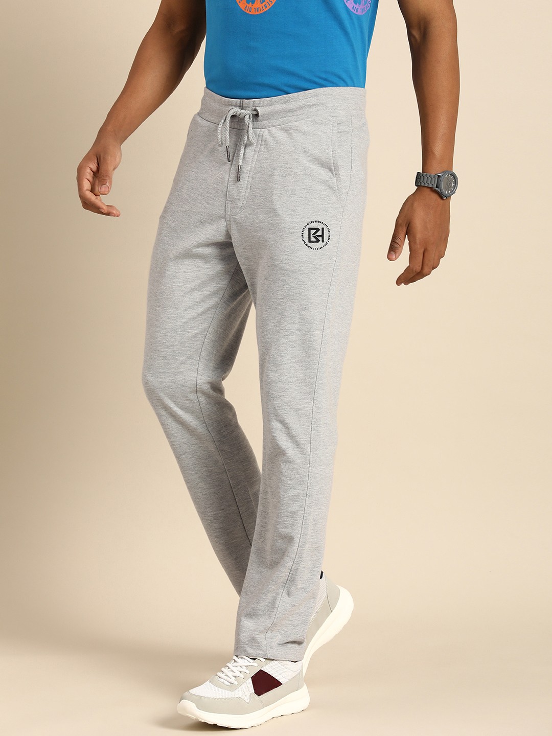 

Being Human Men Solid Mid Rise Track Pants, Grey melange