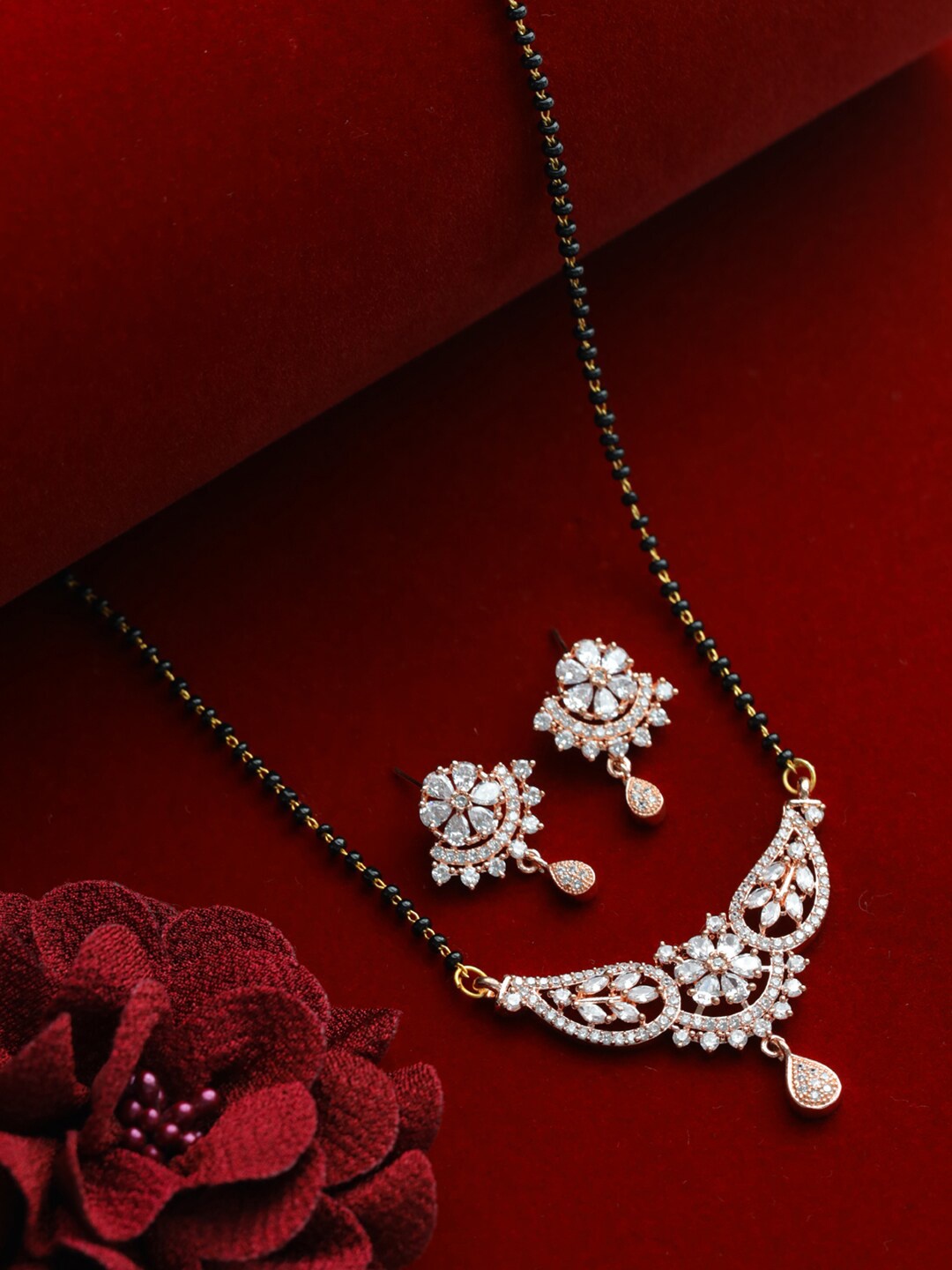 

Jazz and Sizzle Rose Gold-Plated Beaded & AD-Studded Mangalsutra With Earrings