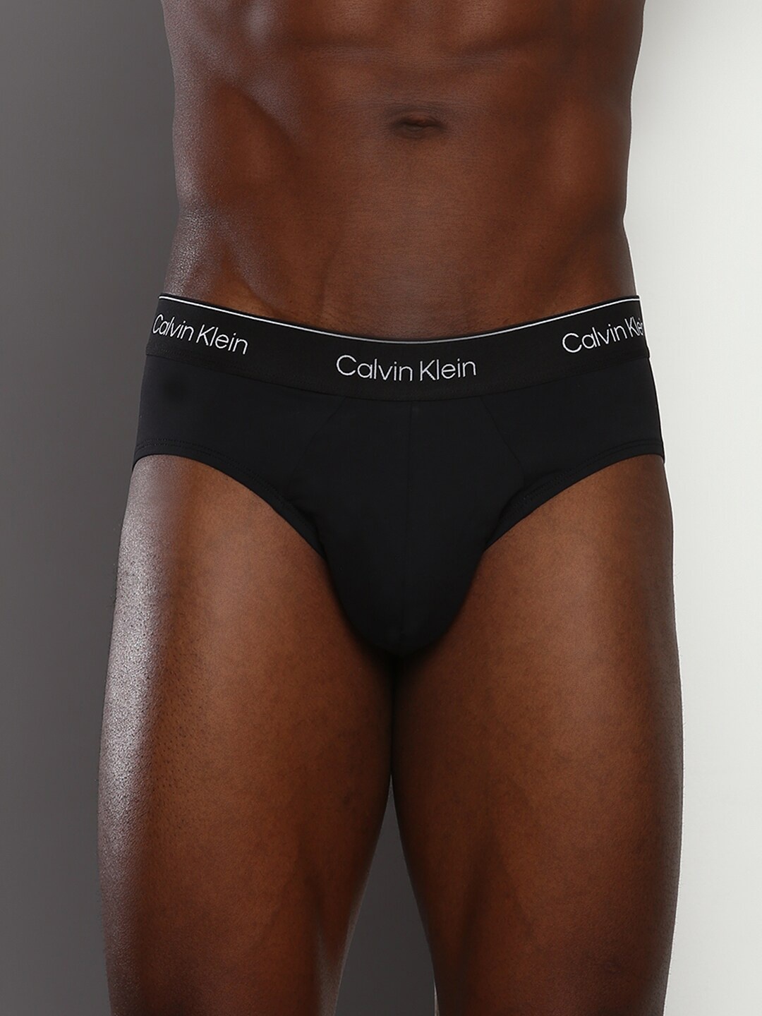 

Calvin Klein Underwear Men Brand Logo Printed Detail Basic Brief, Black