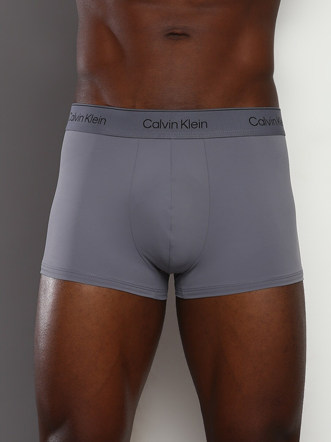 

Calvin Klein Underwear Men Brand Logo Printed Trunk, Grey