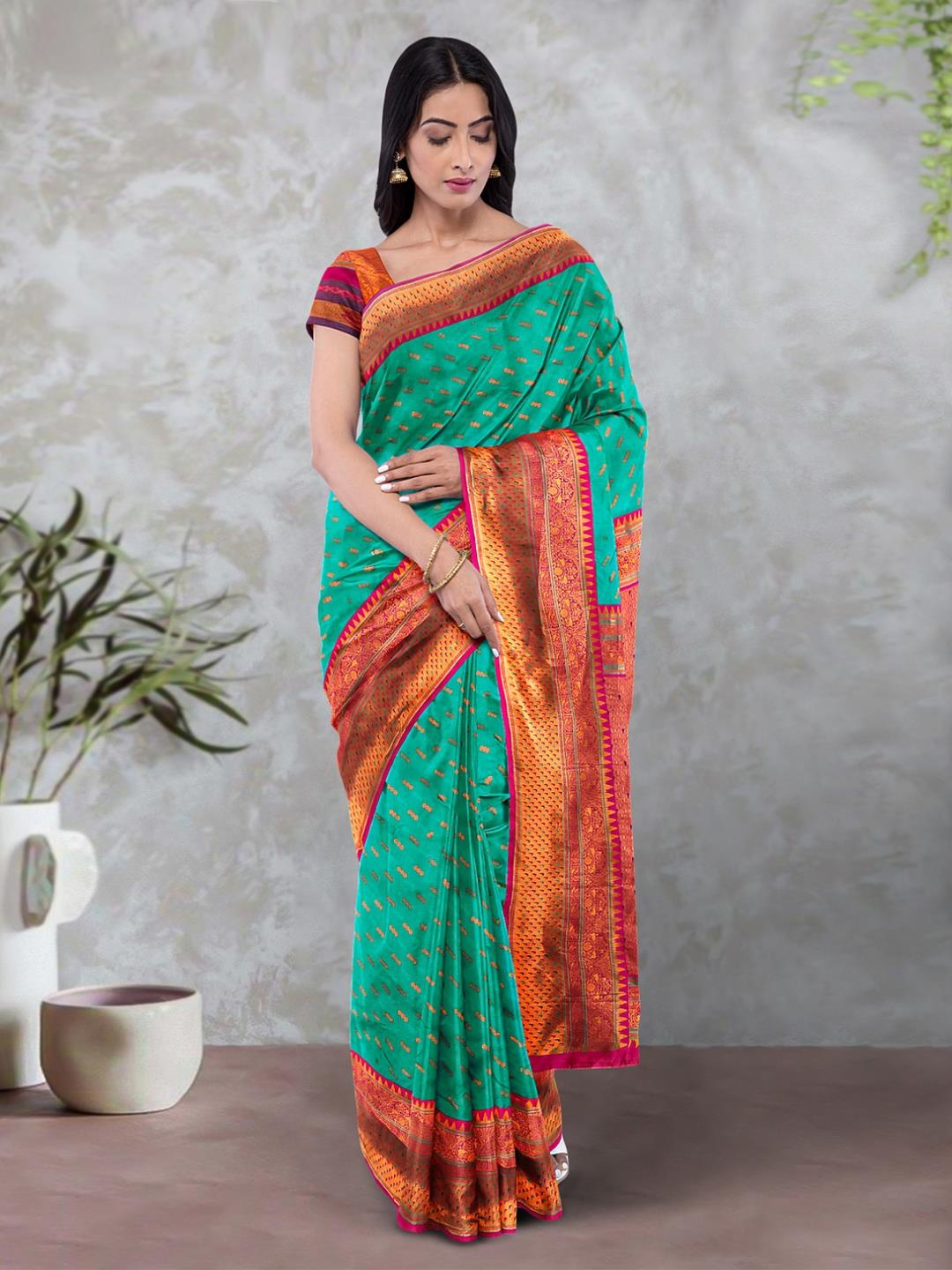 

Kalamandir Floral Motif Woven Design Zari Saree, Teal