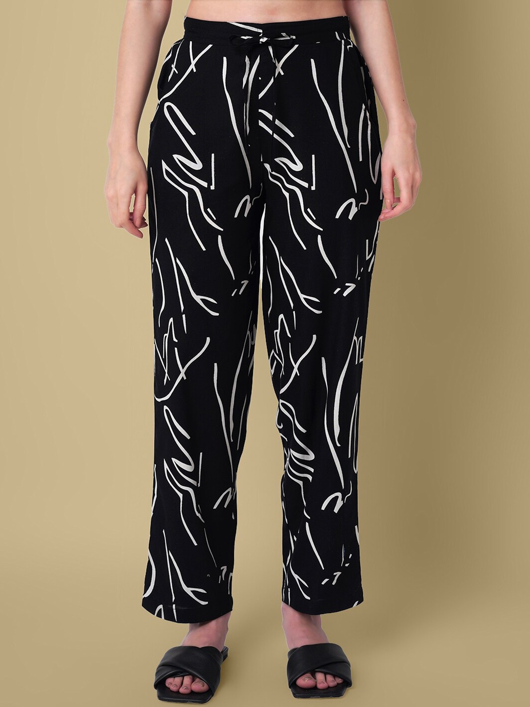 

DAEVISH Women Printed Smart Loose Fit Easy Wash Trousers, Black