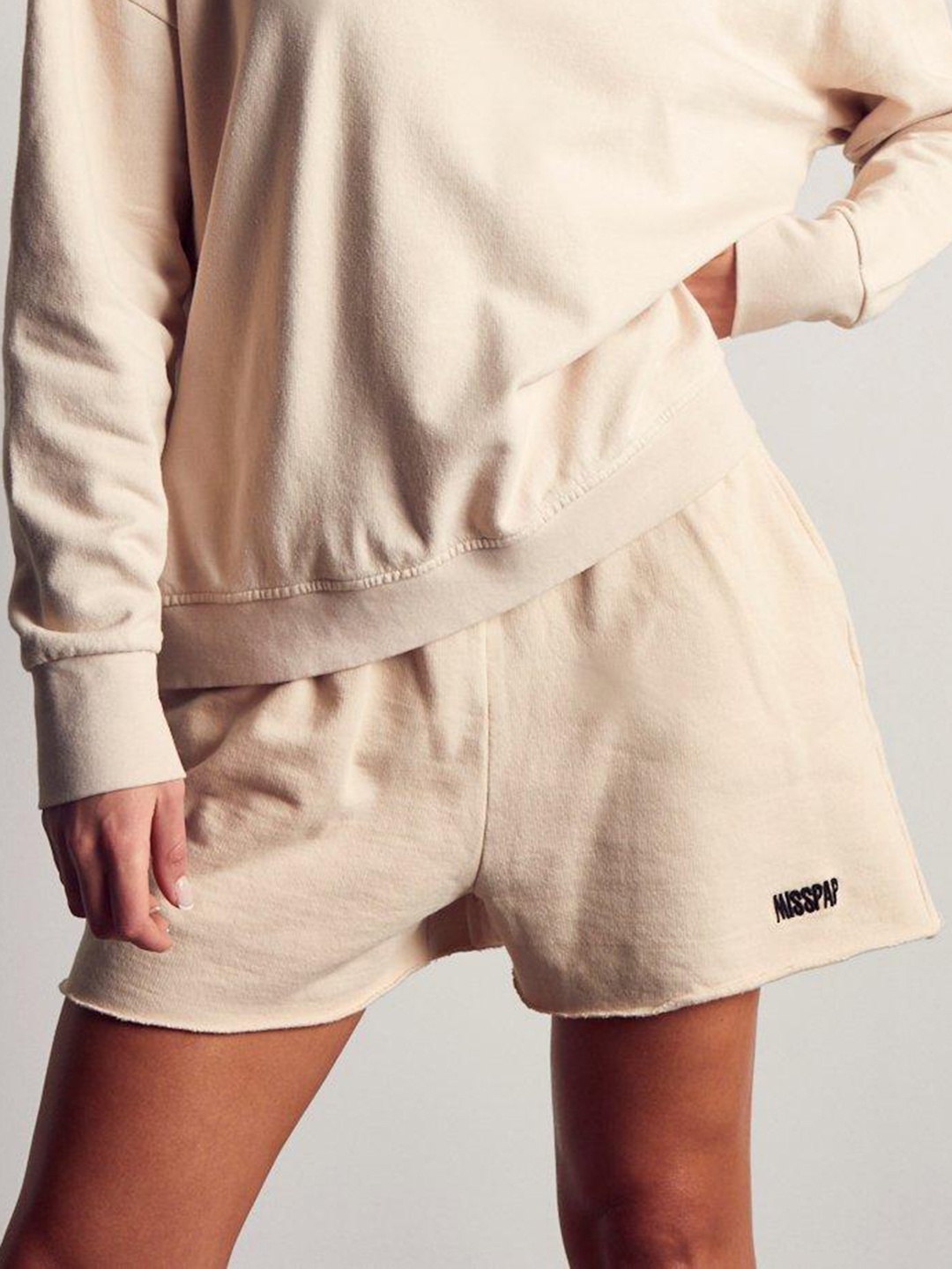 

MISSPAP Raw Hem Pure Cotton Shorts, Beige