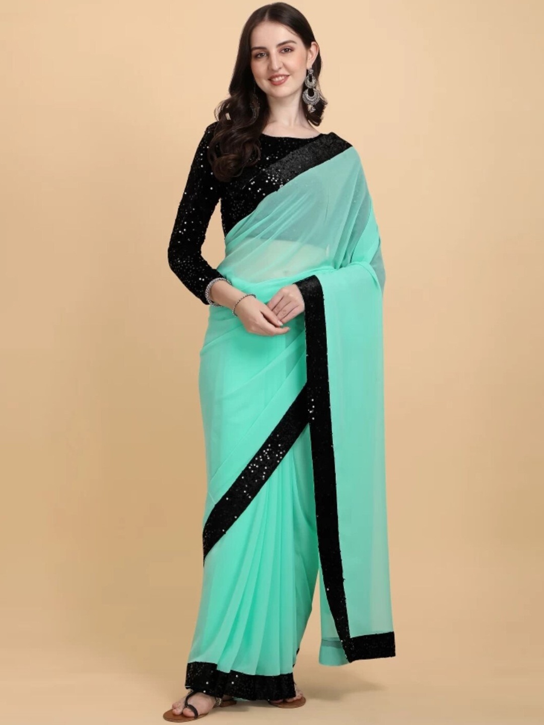 

ORUS Embellished Sequinned Pure Georgette Saree, Sea green