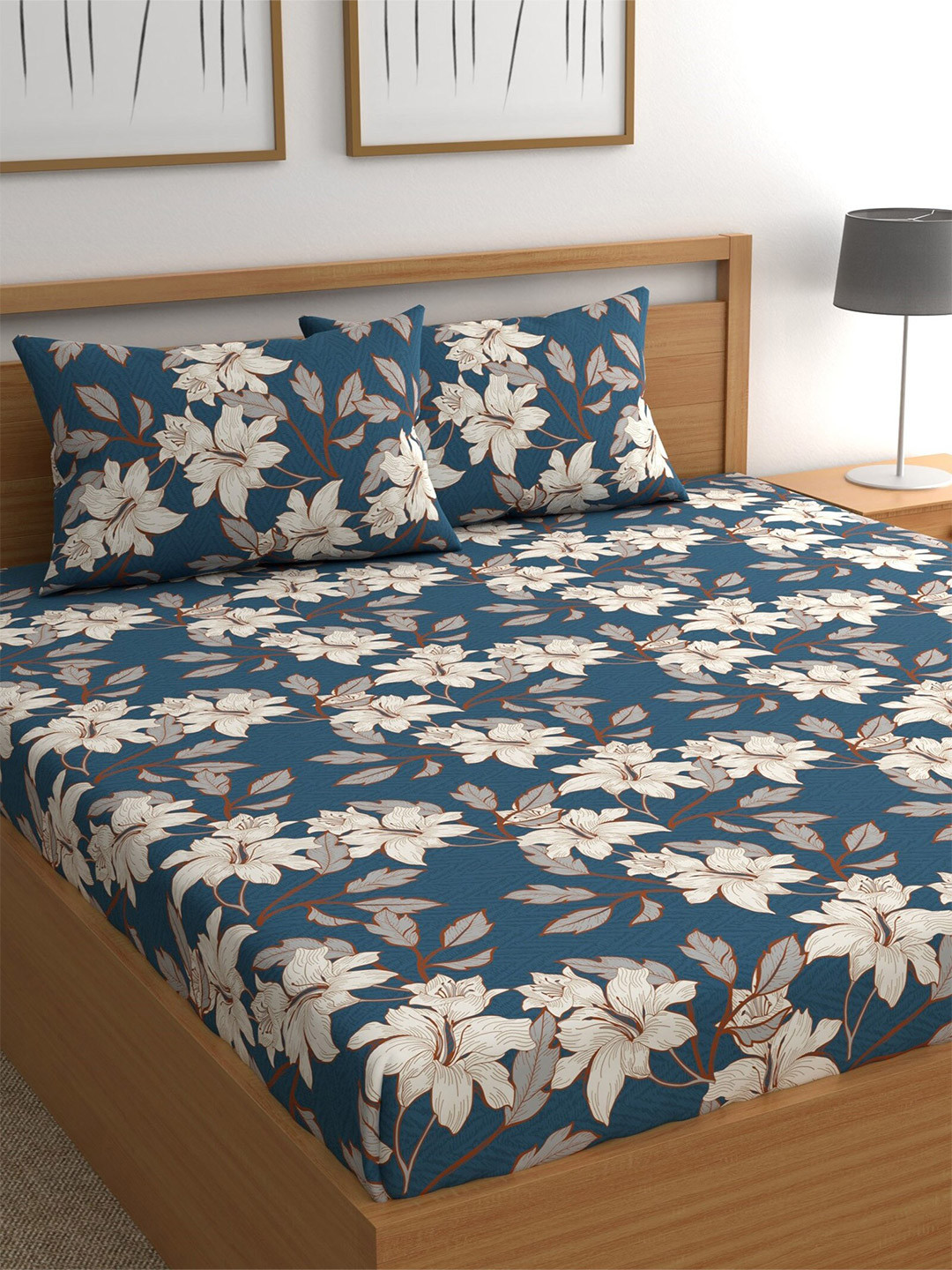 

CHHAVI INDIA Blue & White Floral Printed 210 TC Queen Bedsheet & 2 Pillow Covers
