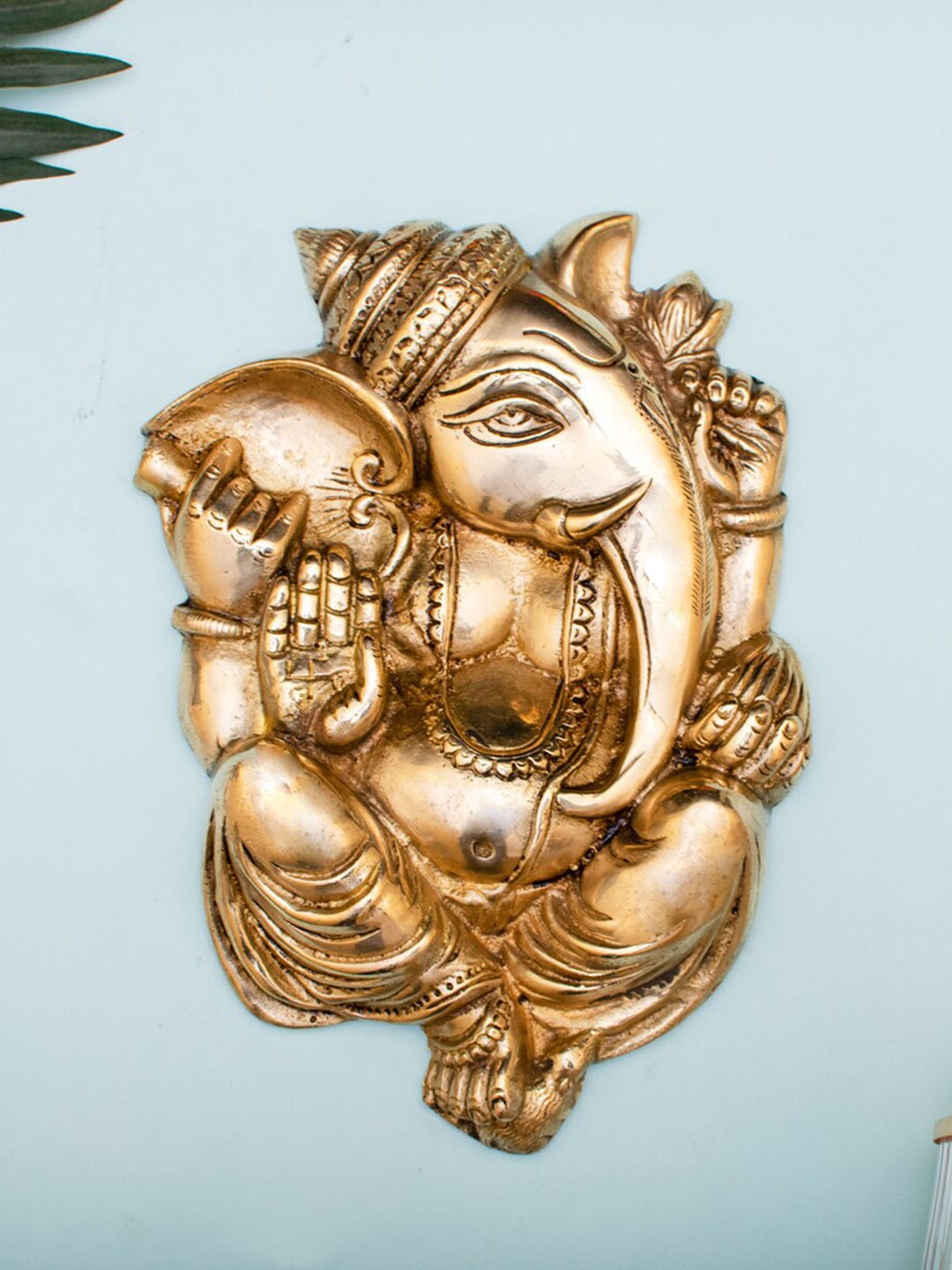 

StatueStudio Statue Gold Toned Ganesha Shaped Brass Wall Hanging Showpieces