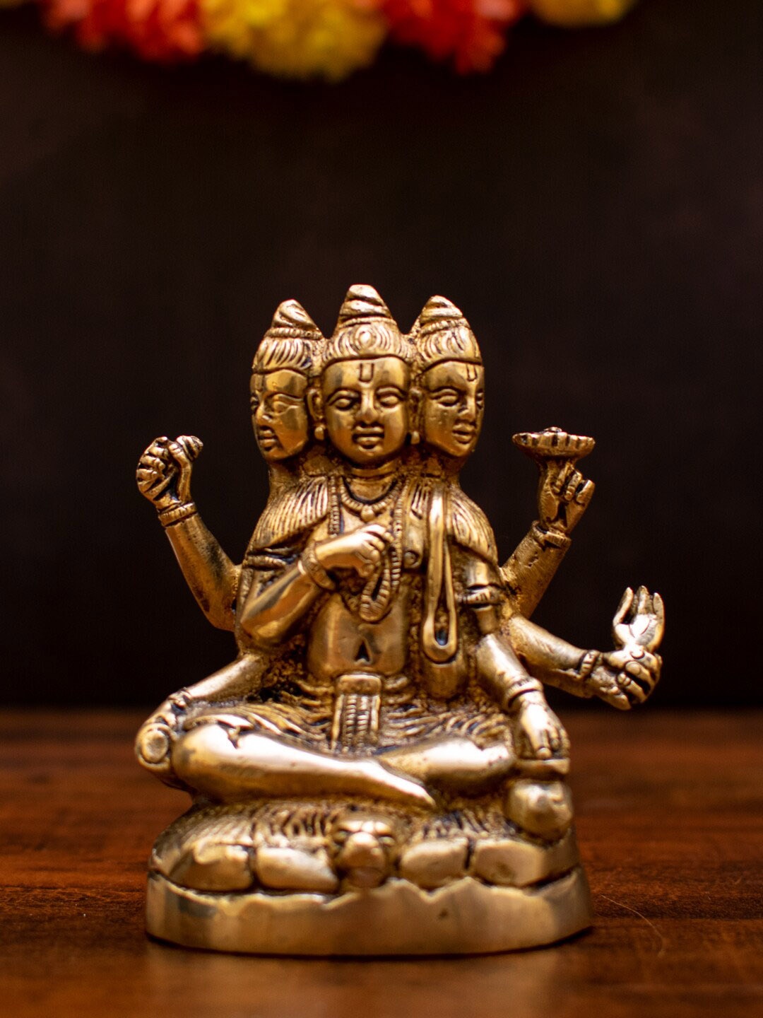 

StatueStudio Gold Toned Trimurti Brass Idol Showpiece
