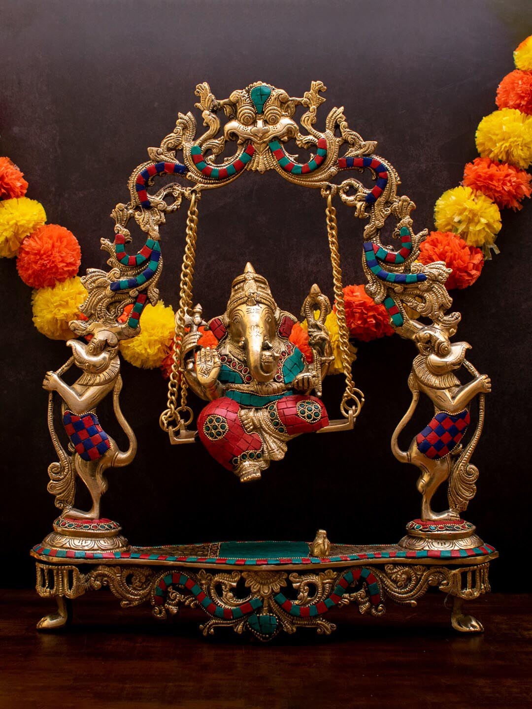 

StatueStudio Gold-Toned & Red Brass Ganesha Idol Swing On Jhula Showpiece