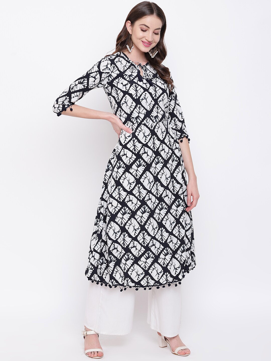 

Napra Abstract Printed Tie-Up Neck A-Line Kurta, Navy blue