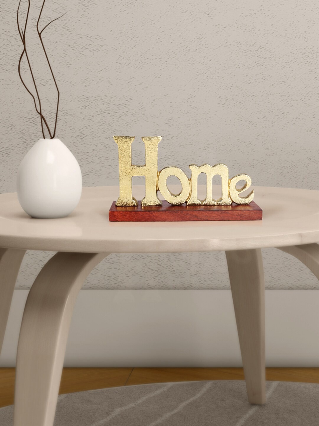 

Living scapes by Pantaloons Gold-Toned & Brown Wooden Showpiece