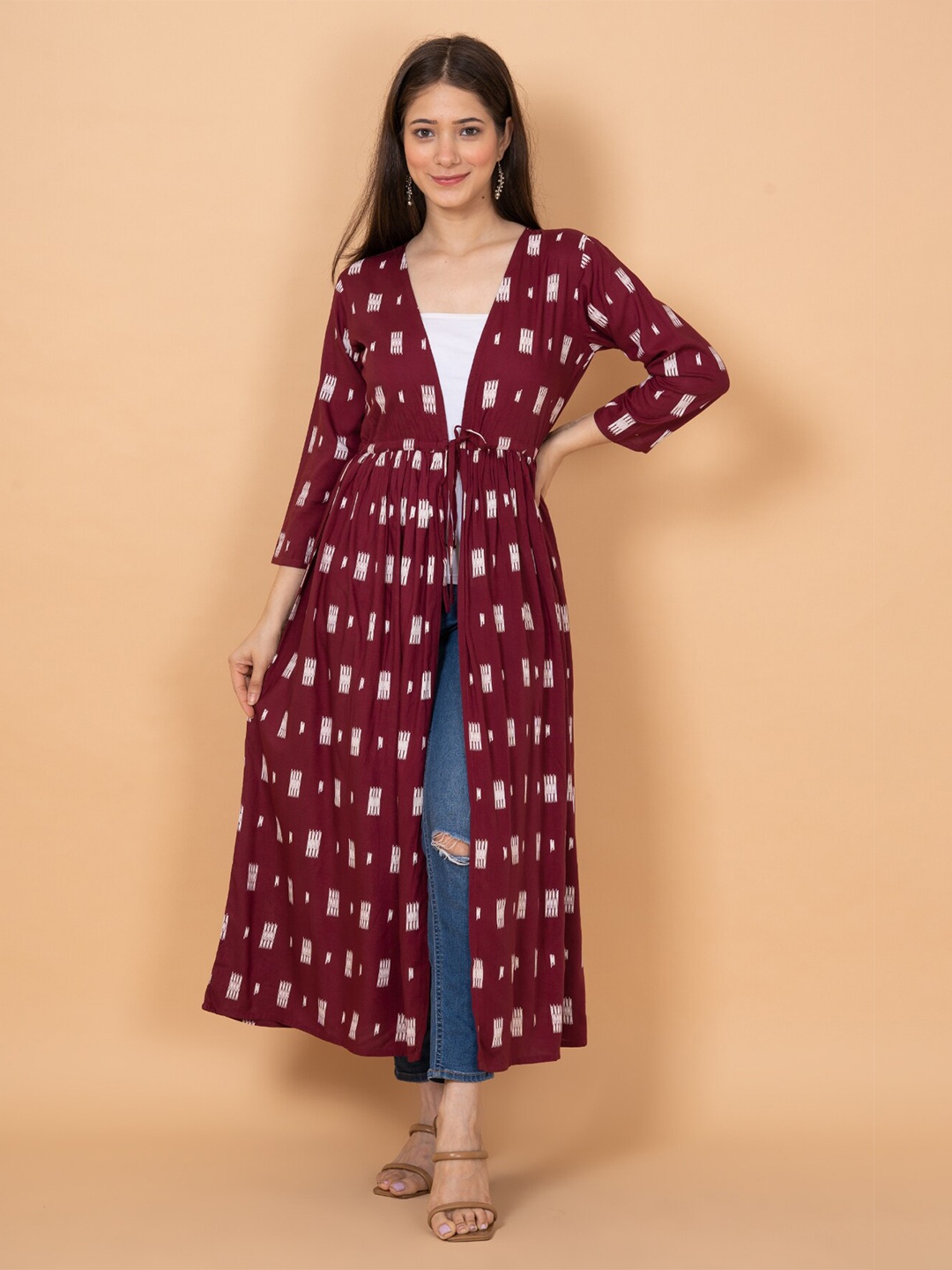 

DAEVISH Women Floral Printed Longline Tie-Up Shrug, Maroon