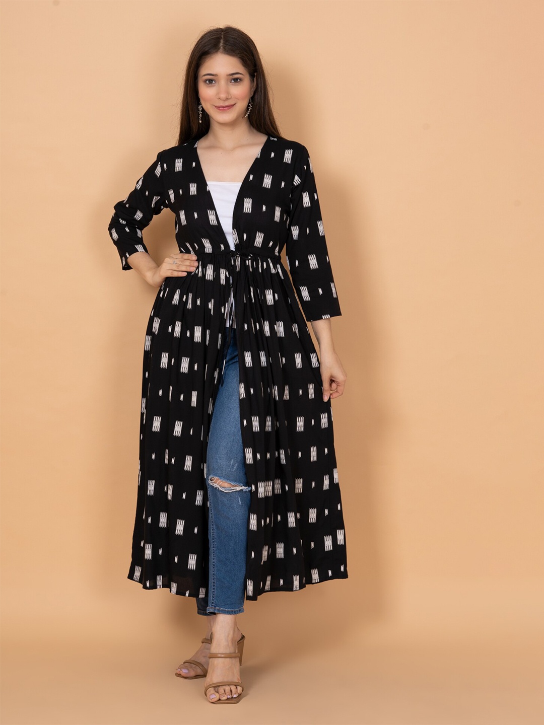 

DAEVISH Women Printed Longline Tie-Up Shrug, Black