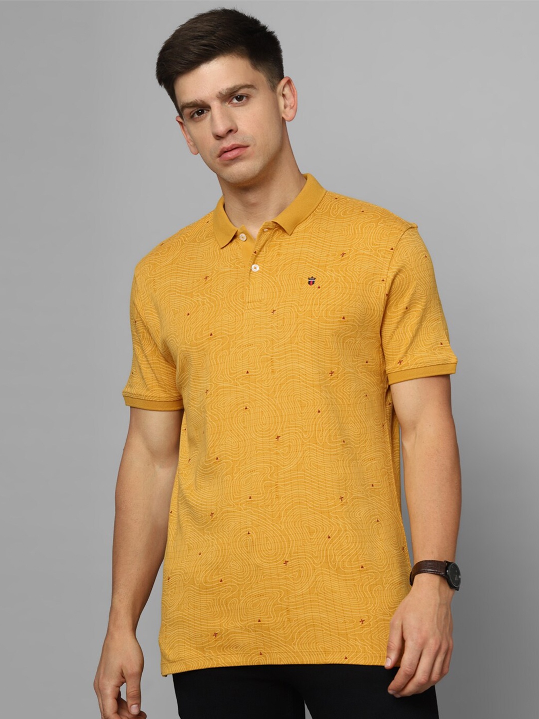 

Louis Philippe Jeans Abstract Printed Polo Collar Slim Fit Pure Cotton T-shirt, Mustard