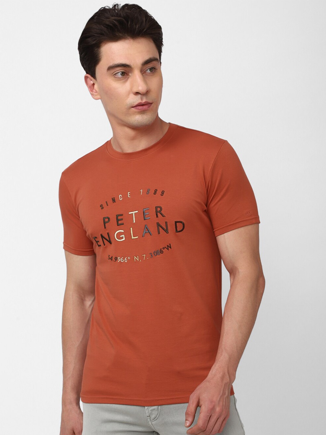 

Peter England Casuals Typography Printed Round Neck Cotton Slim Fit T-shirt, Rust