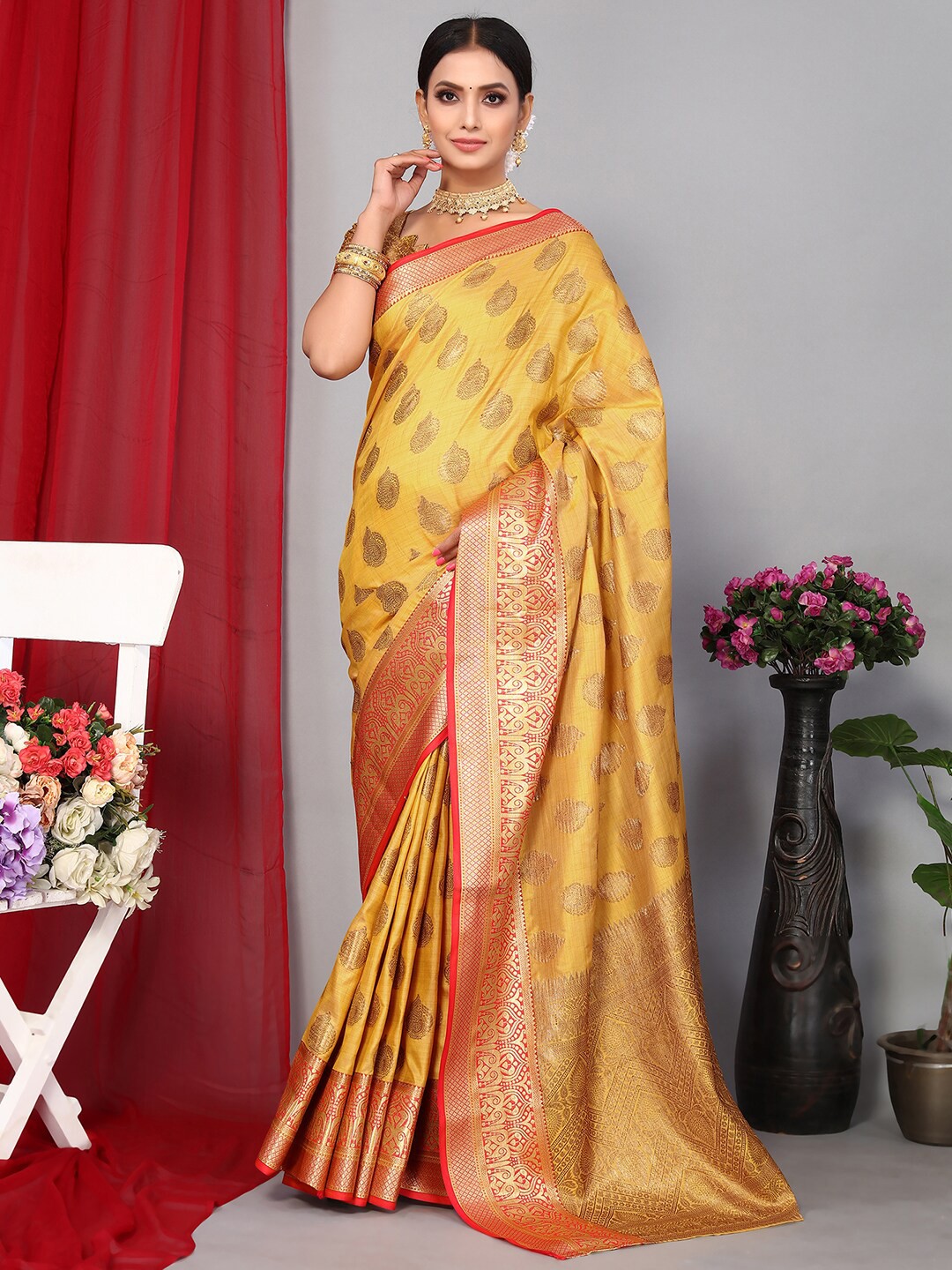 

Satrani Ethnic Motifs Woven Design Zari Banarasi Saree, Yellow