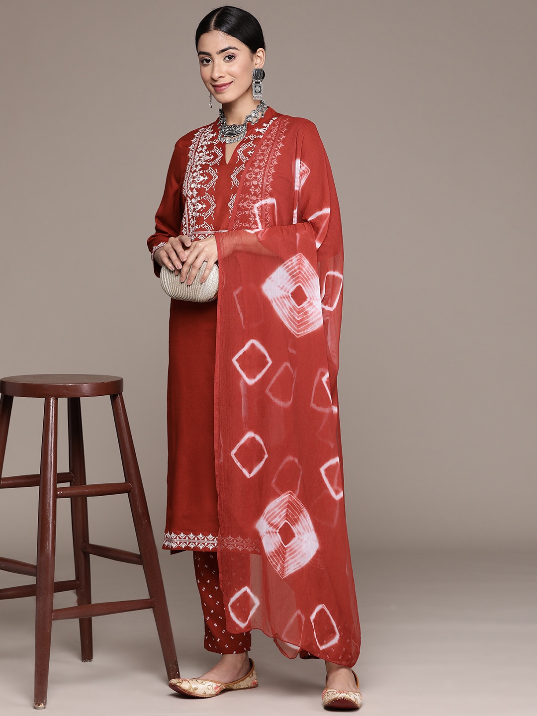 

Anubhutee Embroidered Regular Thread Work Kurta With Trousers & Dupatta, Rust