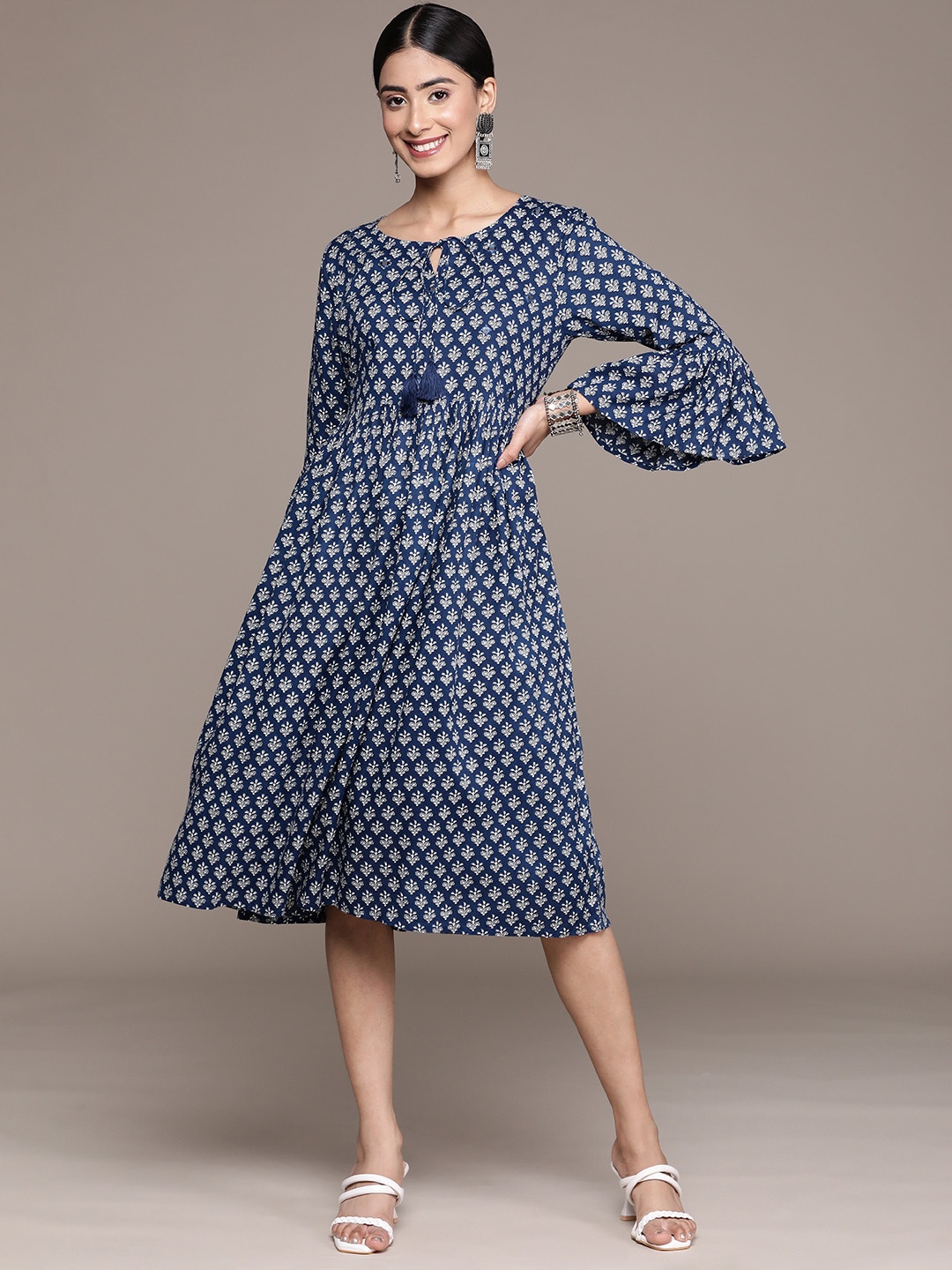 

Anubhutee Ethnic Motifs Print Tie-Up Neck Bell Sleeves A-Line Ethnic Dress, Navy blue