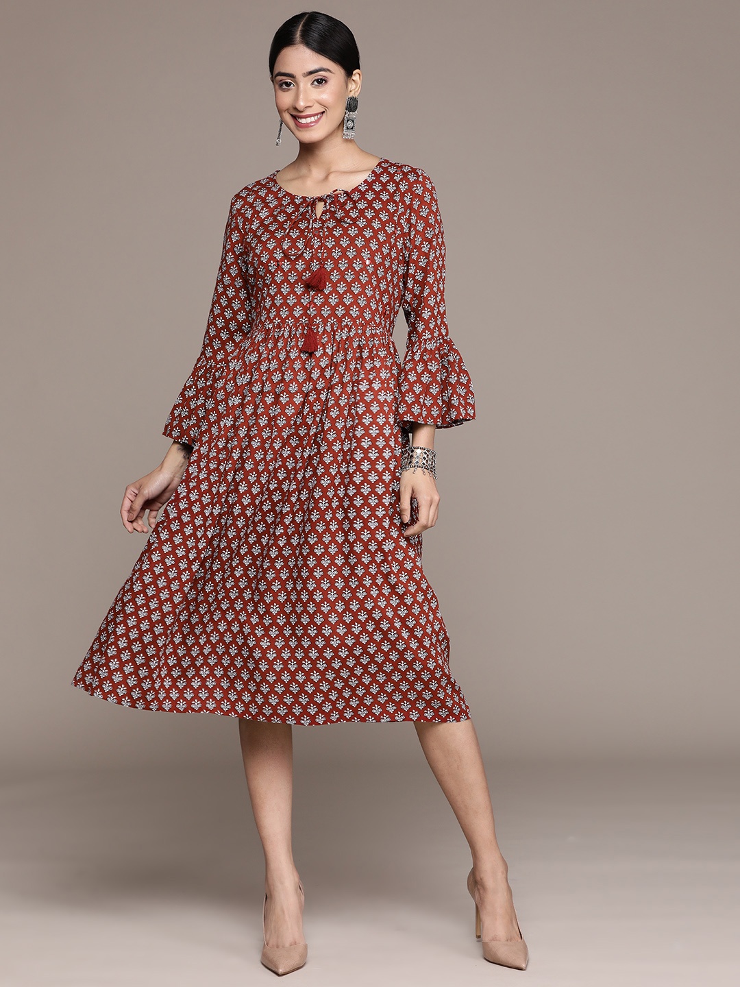 

Anubhutee Ethnic Motifs Print Tie-Up Neck Bell Sleeves A-Line Ethnic Dress, Maroon