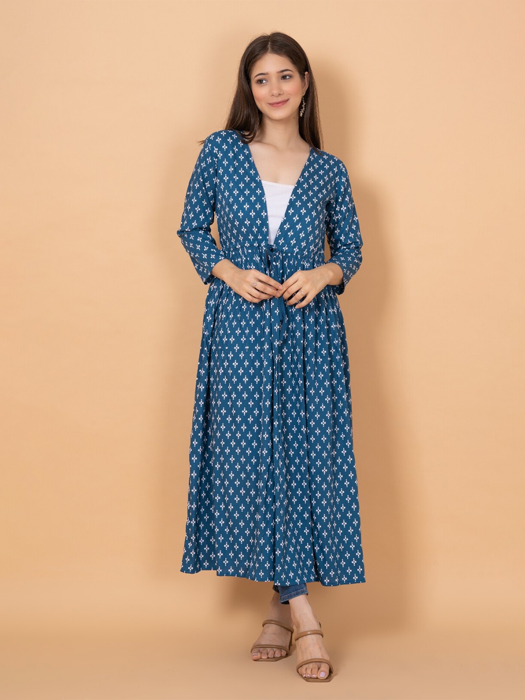 

DAEVISH Women Printed Longline Tie-Up Shrug, Blue