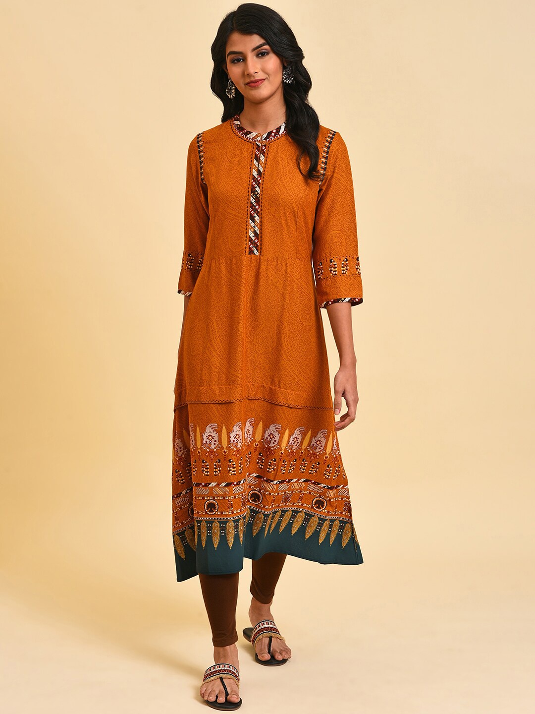 

W Ethnic Motifs Printed Thread Work Kurta with Leggings, Mustard