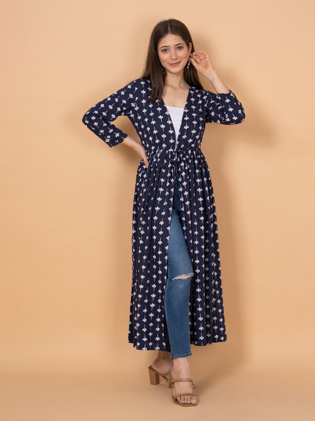 

DAEVISH Women Floral Printed Longline Tie-Up Shrug, Blue