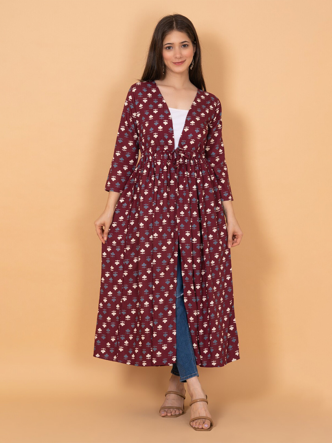 

DAEVISH Women Floral Printed Longline Tie-Up Shrug, Maroon