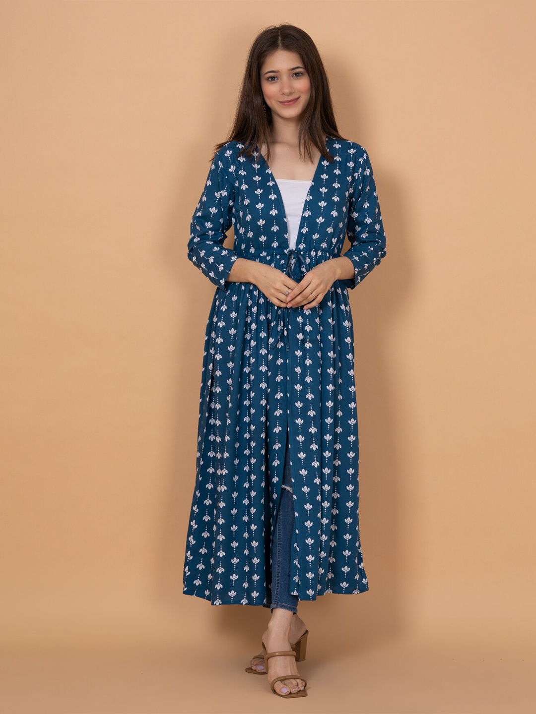 

DAEVISH Women Floral Printed Longline Tie-Up Shrug, Blue