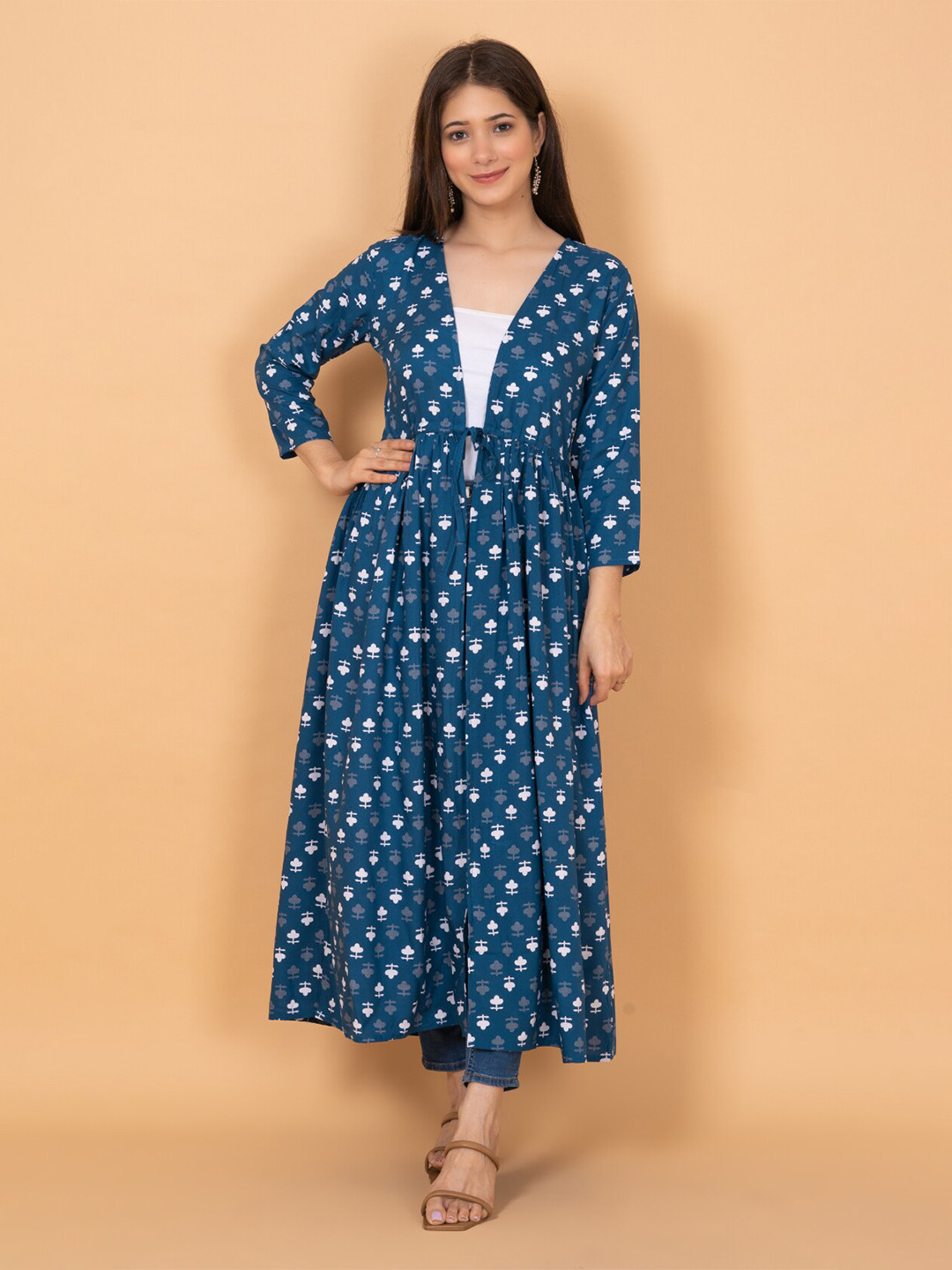

DAEVISH Women Floral Printed Longline Tie-Up Shrug, Blue