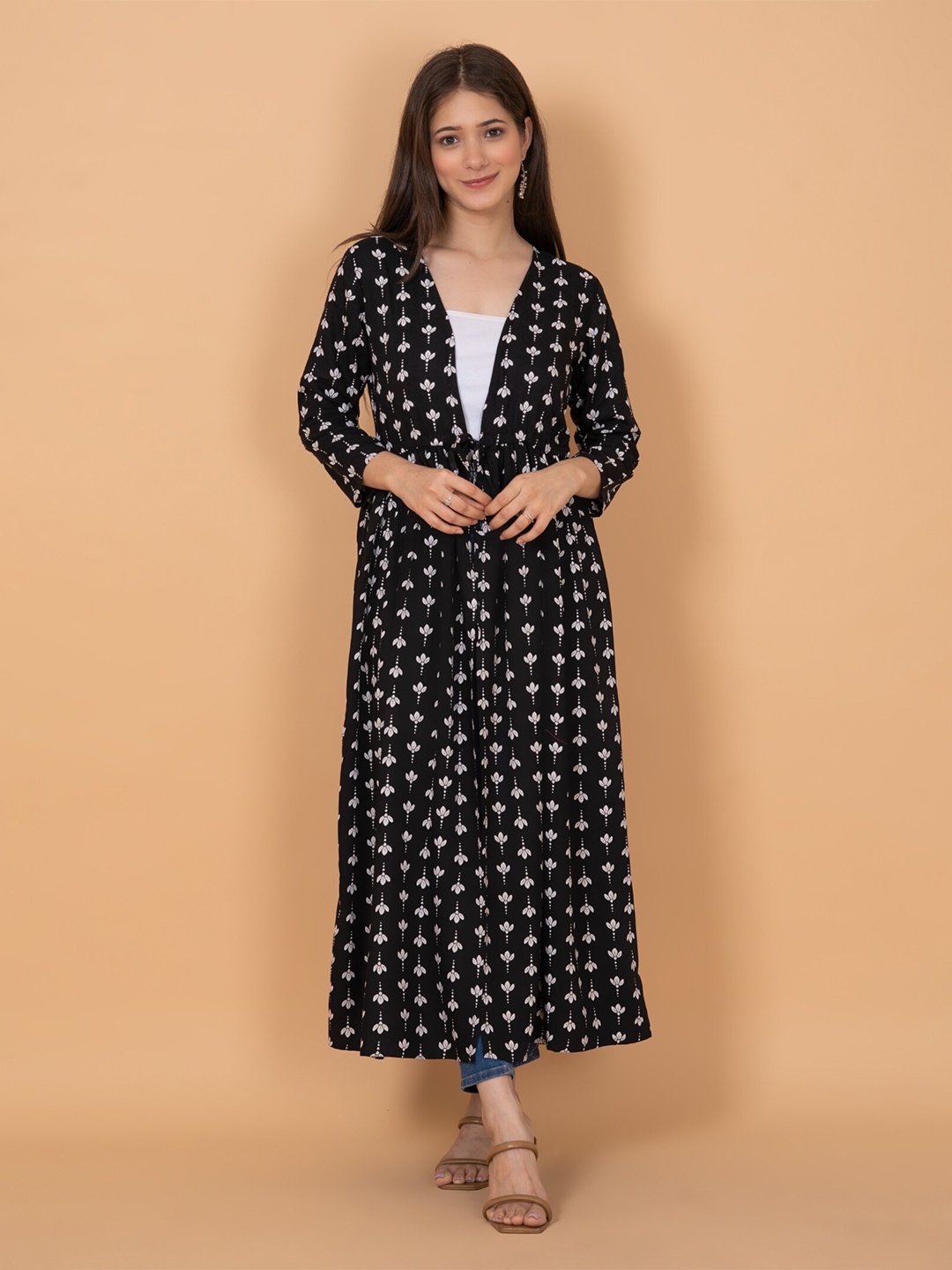 

DAEVISH Women Floral Printed Longline Tie-Up Shrug, Black