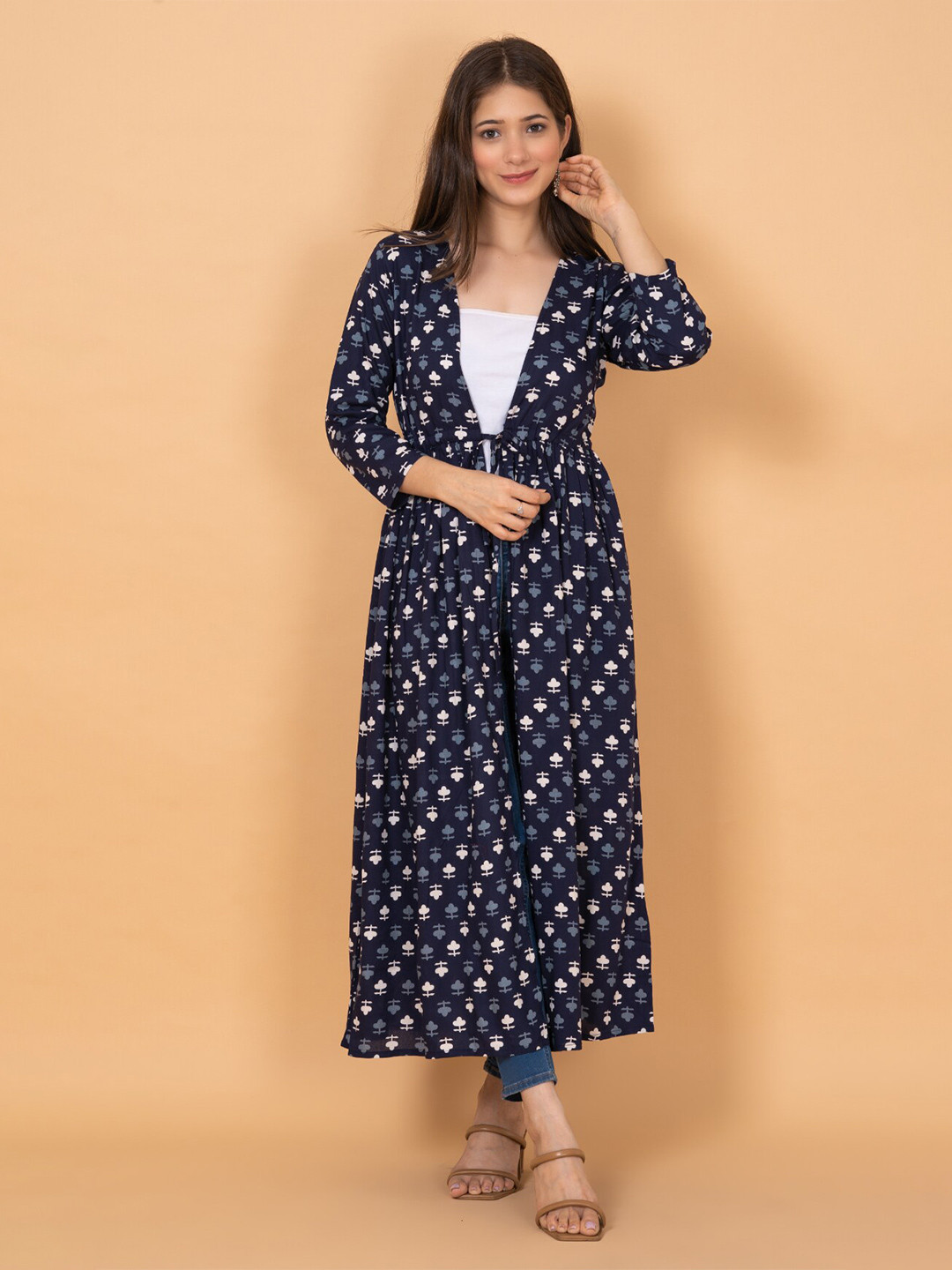 

DAEVISH Women Floral Printed Longline Tie-Up Shrug, Blue