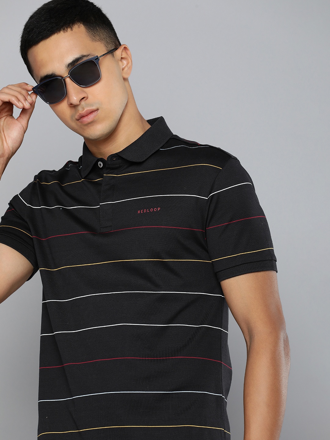 

Levis Men Pure Cotton Striped Polo Collar Slim Fit T-shirt, Black