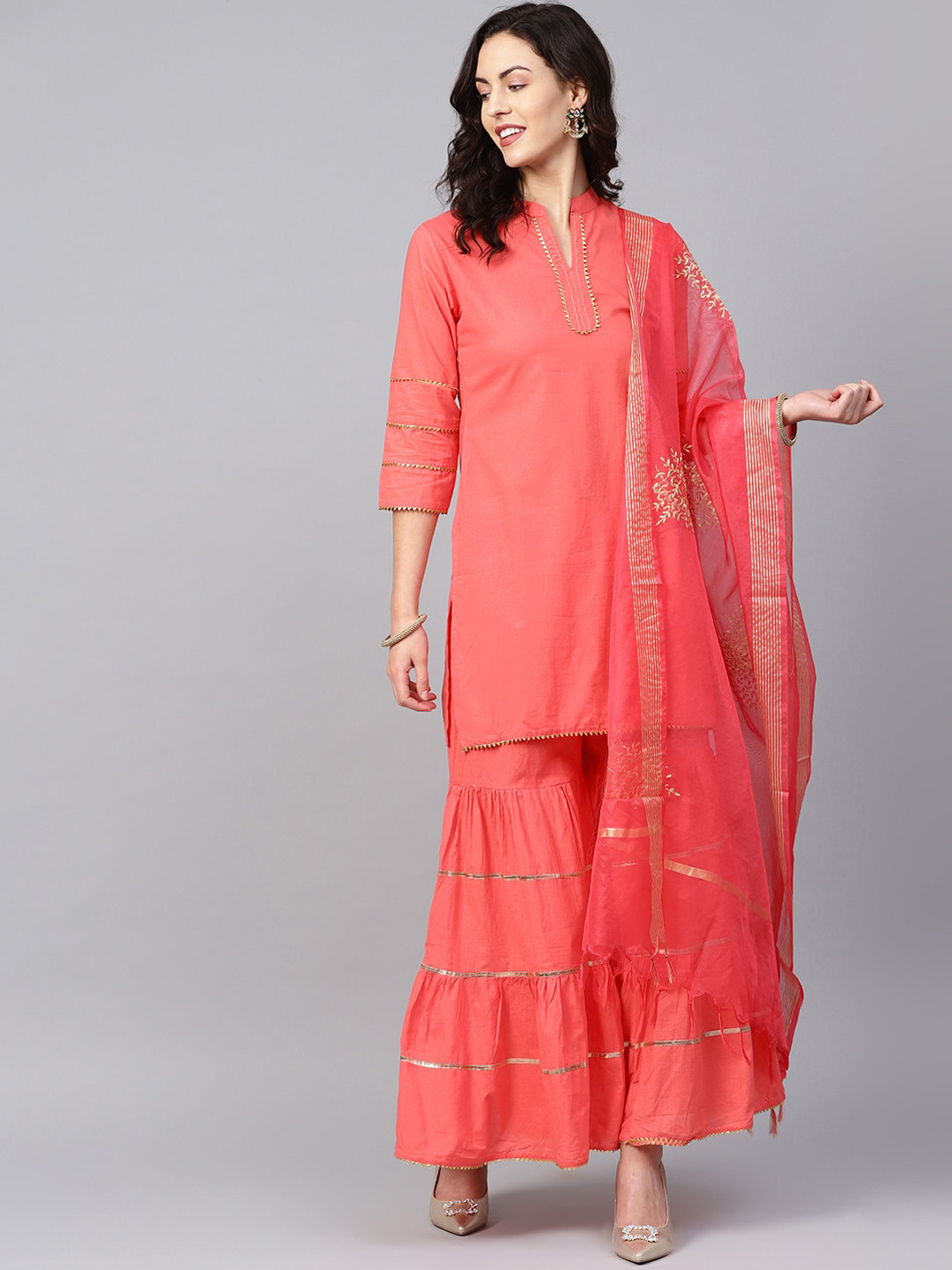 

Bhama Couture Women Peach-Coloured Regular Kurta with Sharara & With Dupatta