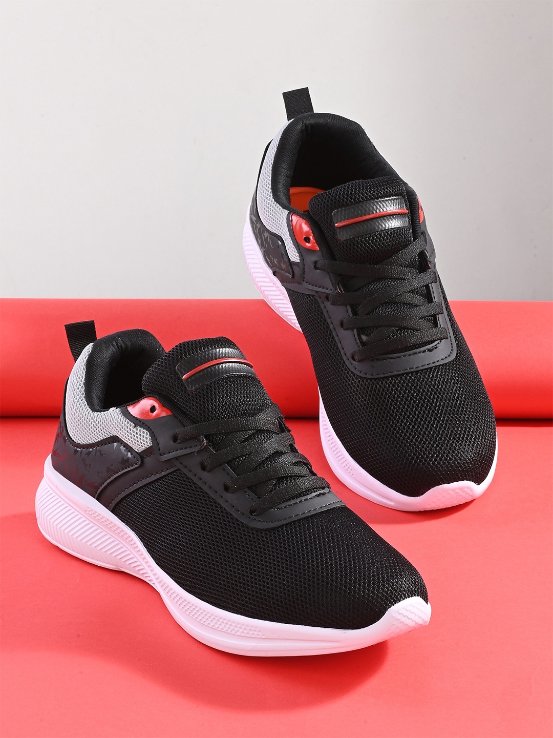 

Roadster Men Self Design Running Sports Shoes, Black