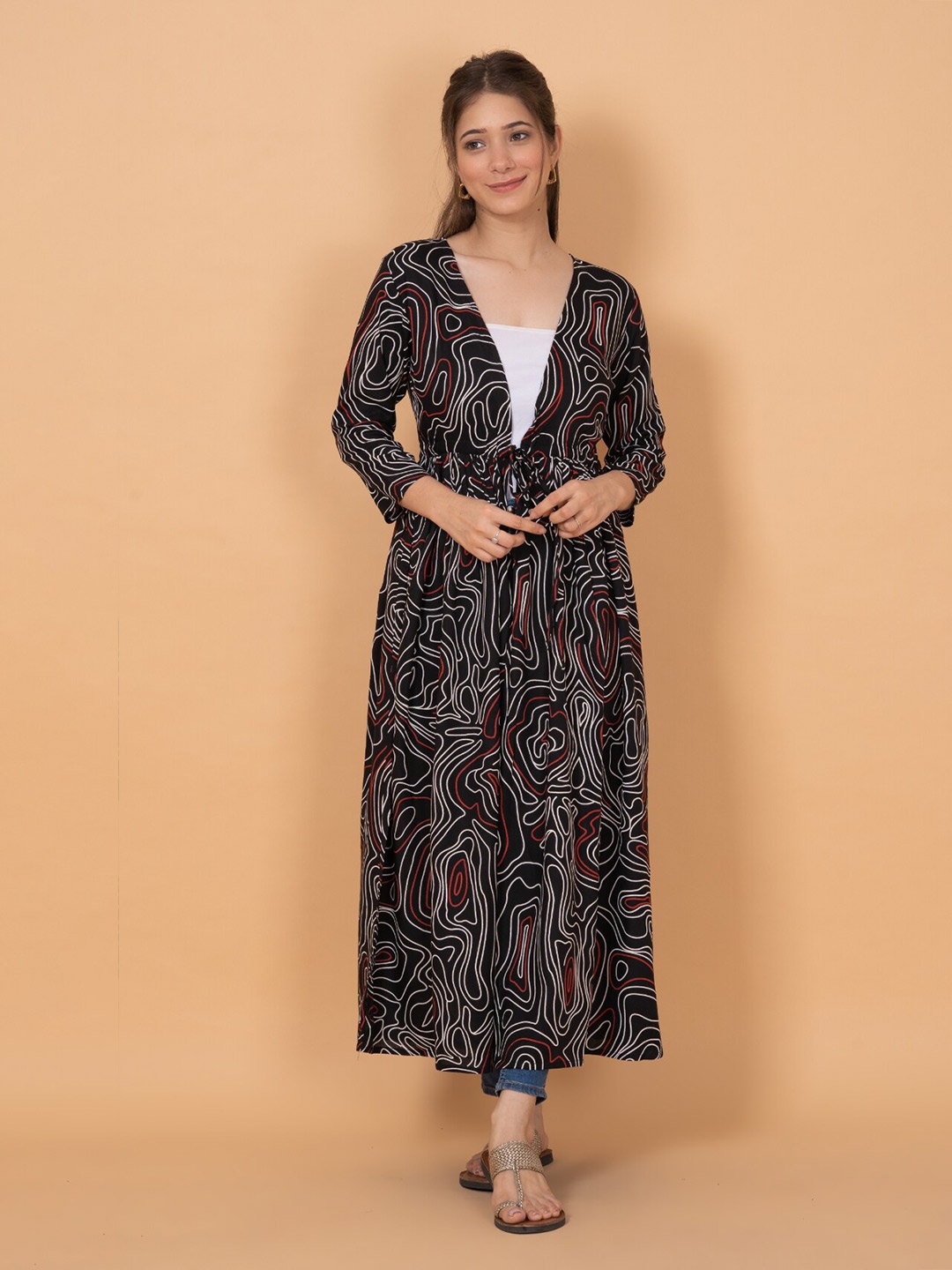 

DAEVISH Women Abstract Printed Longline Tie-Up Shrug, Black