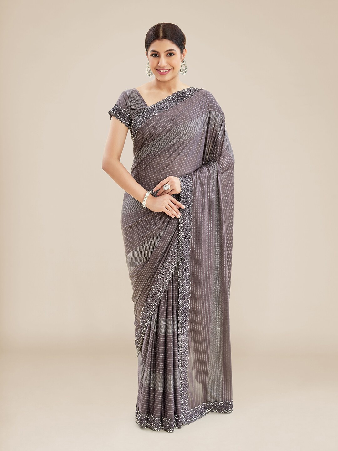 

Kalyan Silks Striped Beads and Stones Embellished Saree, Purple