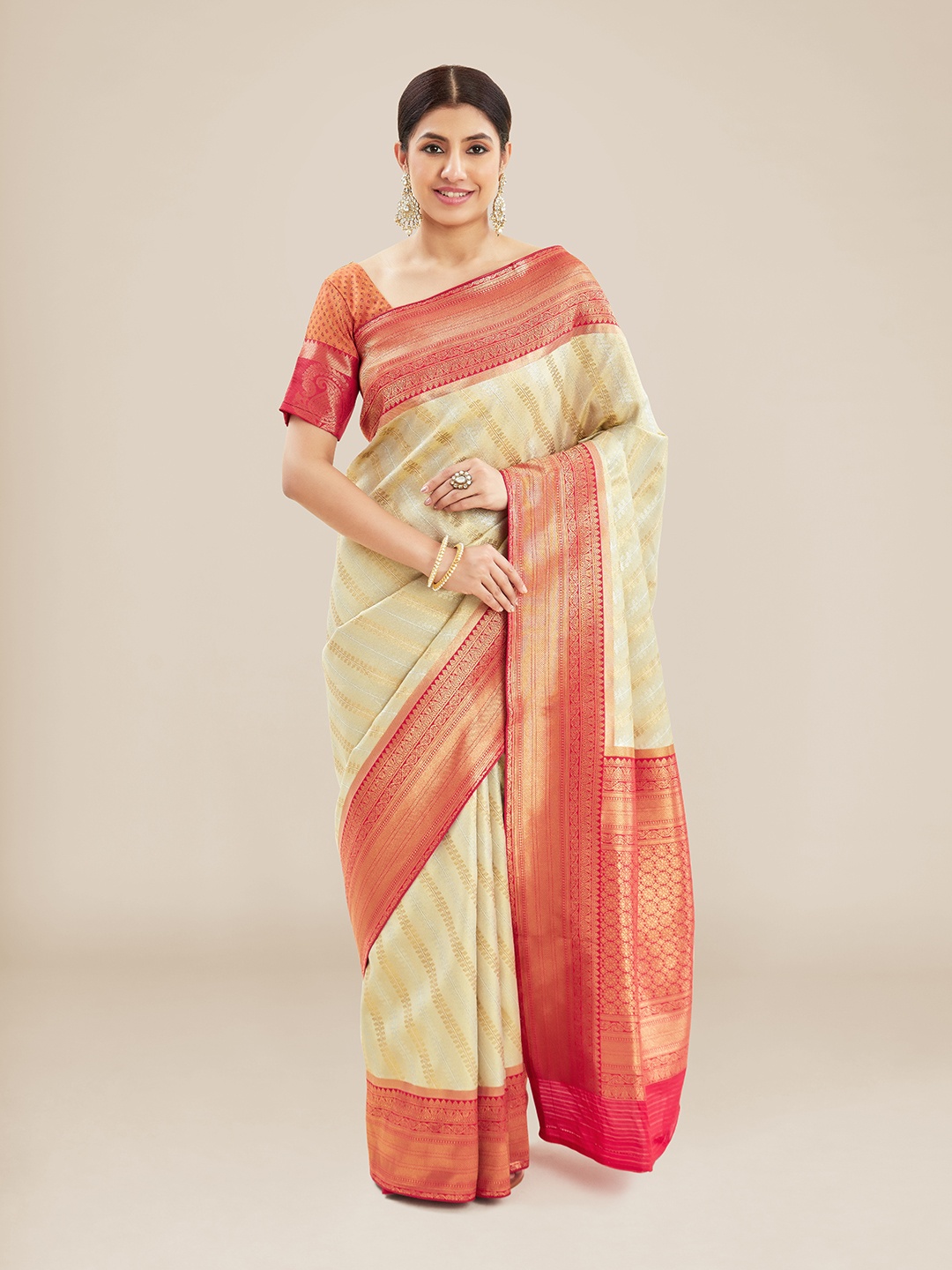 

Kalyan Silks Beige & Red Woven Design Zari Silk Blend Mysore Silk Saree