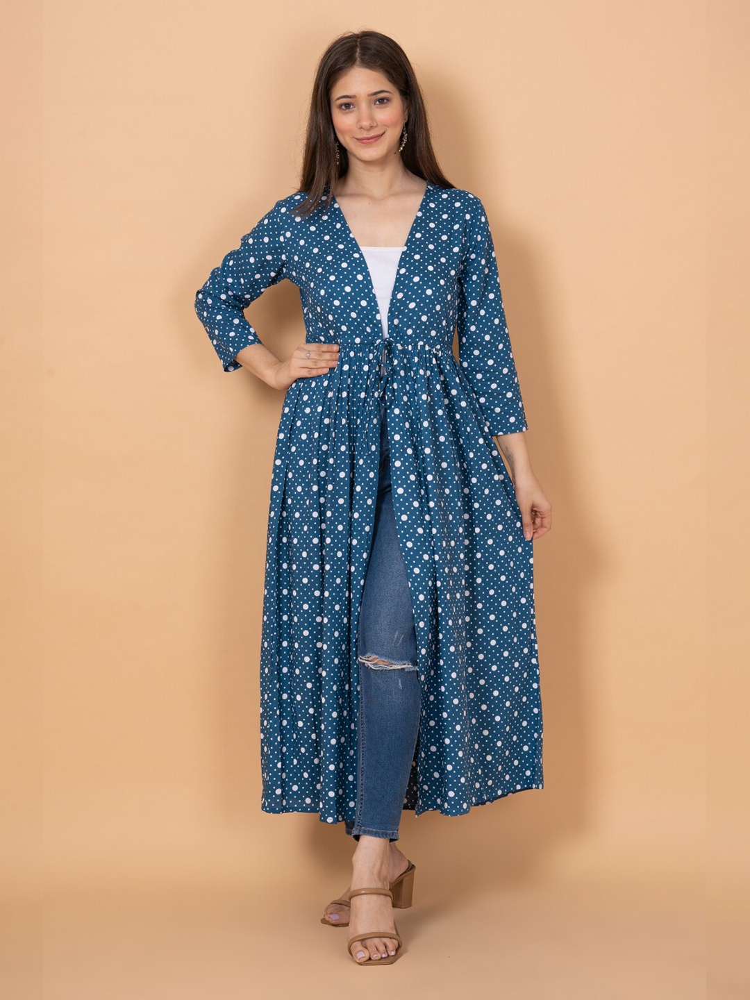 

DAEVISH Women Blue & White Printed Longline Tie-Up Shrug