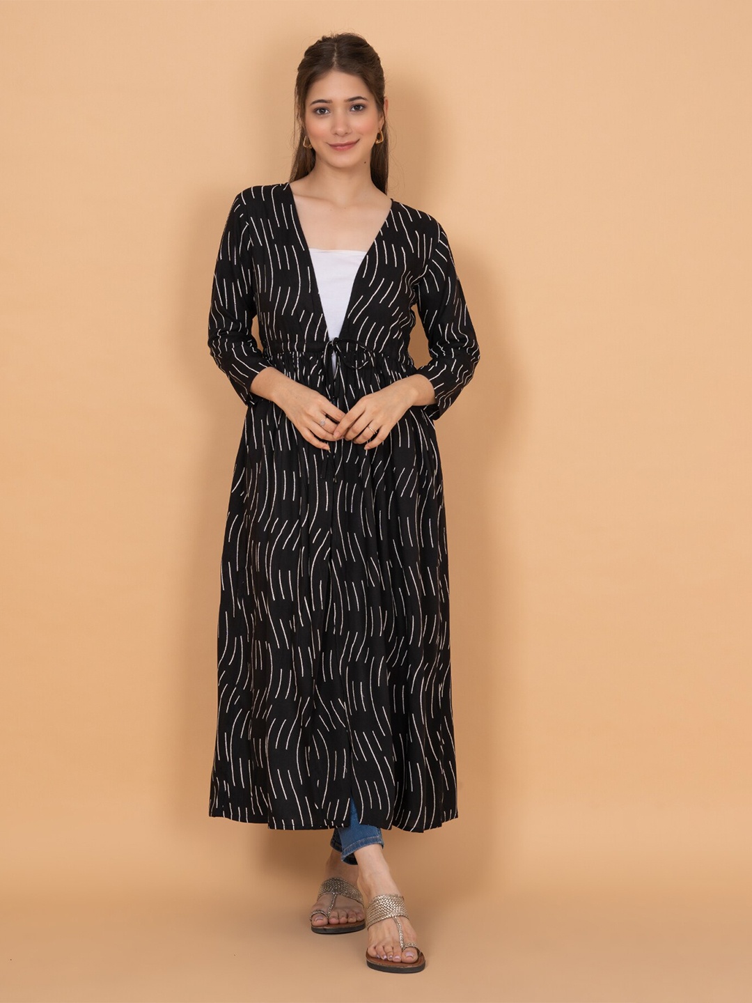 

DAEVISH Women Geometric Printed Longline Tie-Up Shrug, Black