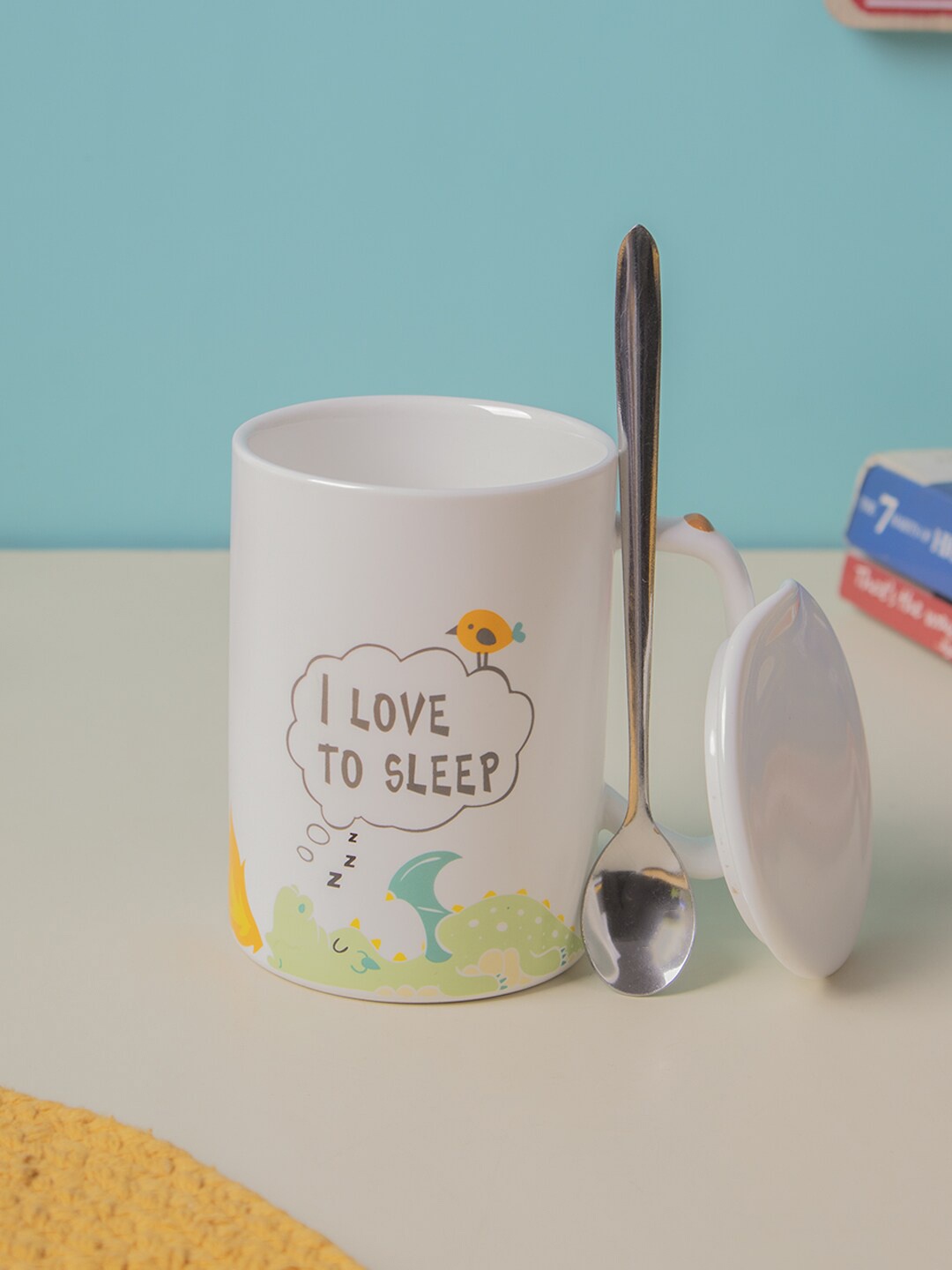 

MARKET99 Off White & Green Printed Ceramic Glossy Mug With Lid & Spoon 400 ml