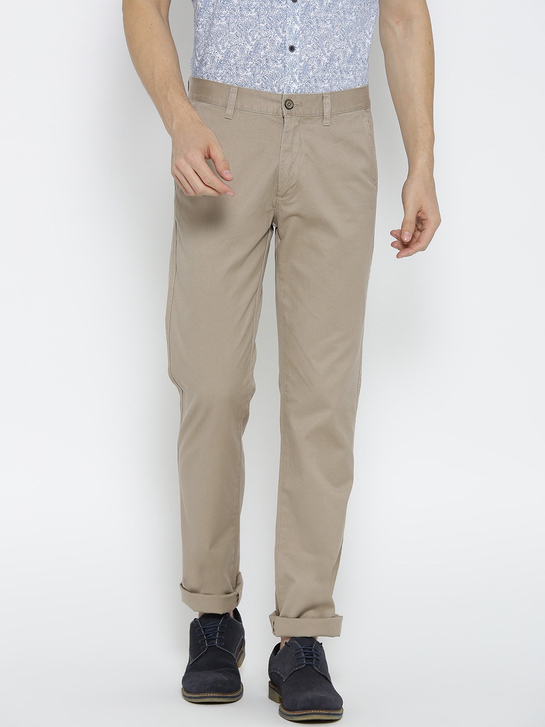 

Arrow Sport Men Beige Slim Fit Solid Regular Trousers