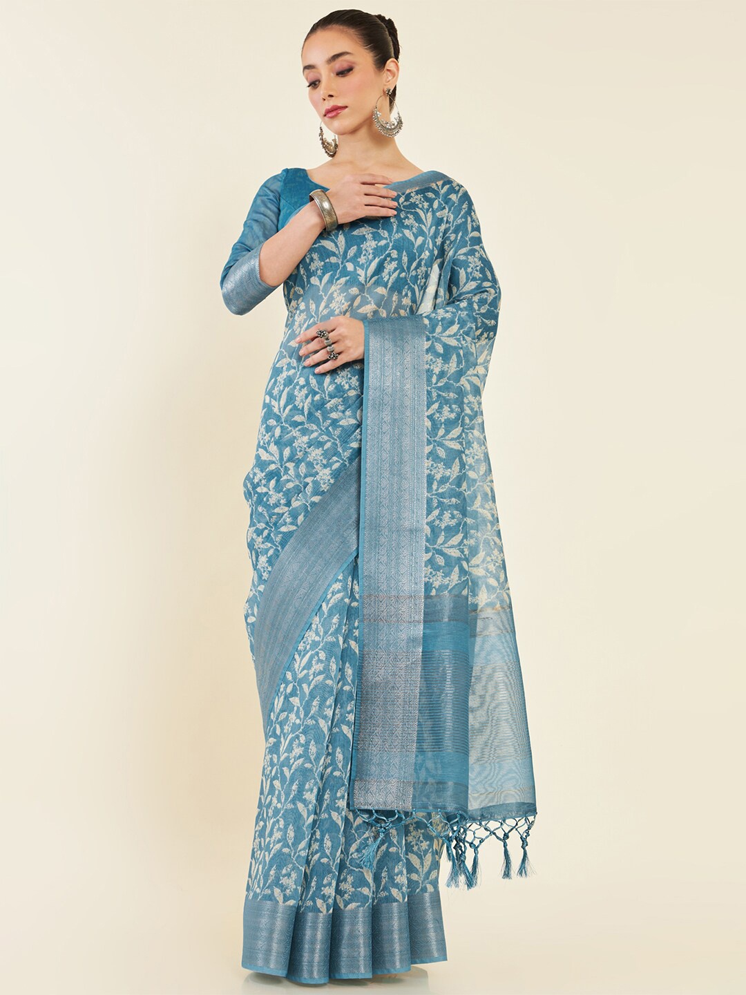 

Soch Teal & Silver-Toned Floral Zari Art Silk Saree