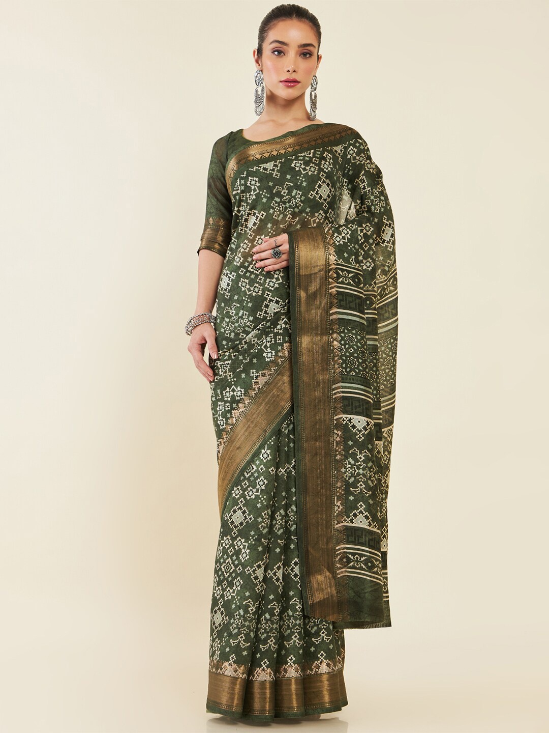 

Soch Olive Green & White Ethnic Motifs Zari Art Silk Saree