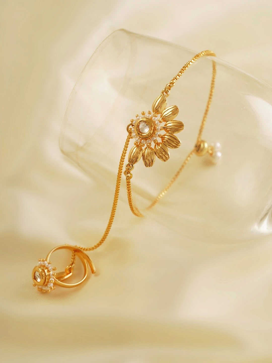 

Abhishti Women Gold-Plated Gold-Plated Chameli Hathphool Ring Bracelet