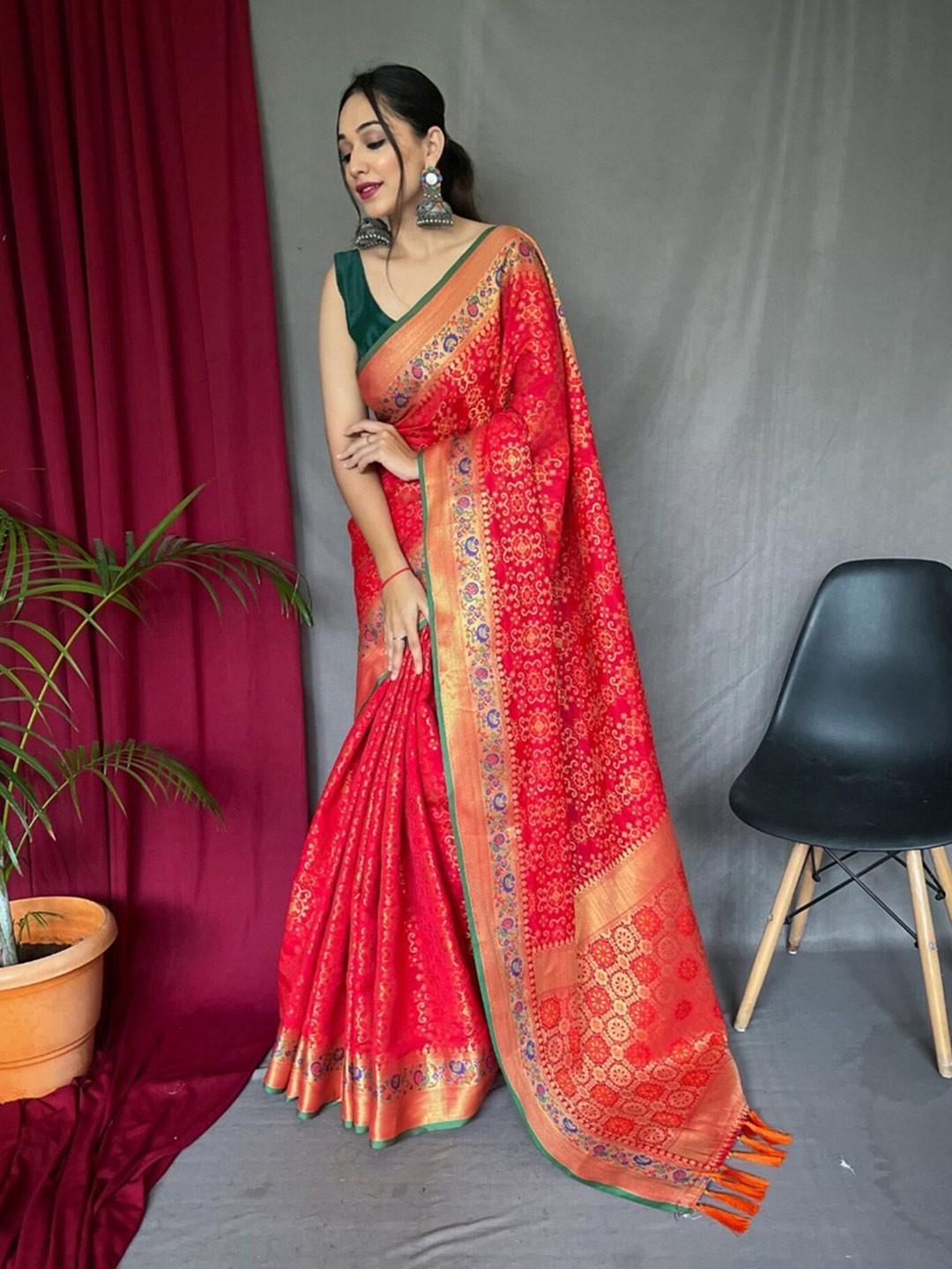 

Mitera Ethnic Motifs Woven Design Zari Silk Blend Patola Saree, Red