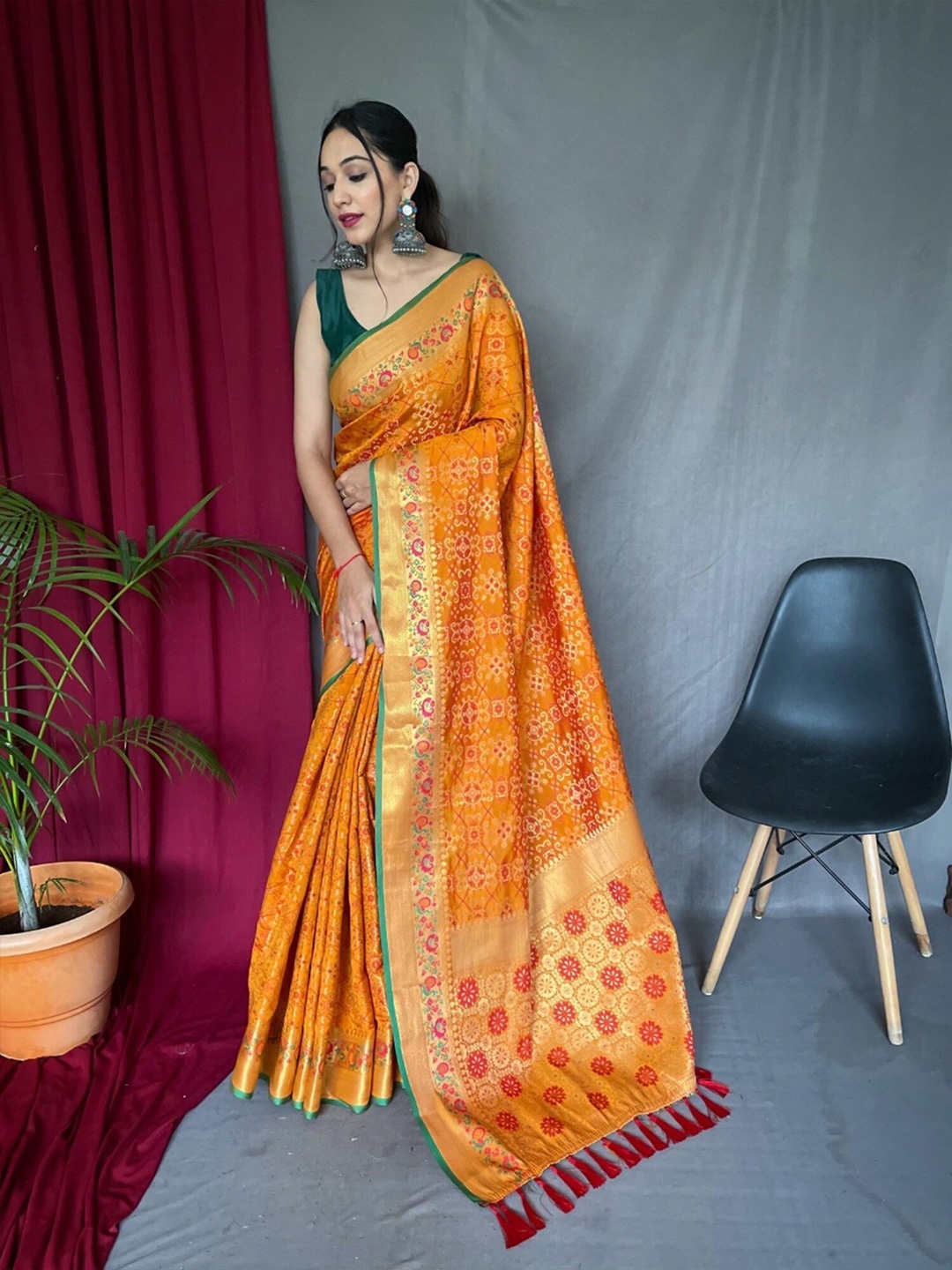 

Mitera Ethnic Motif Silk Blend Patola Zari Saree, Orange