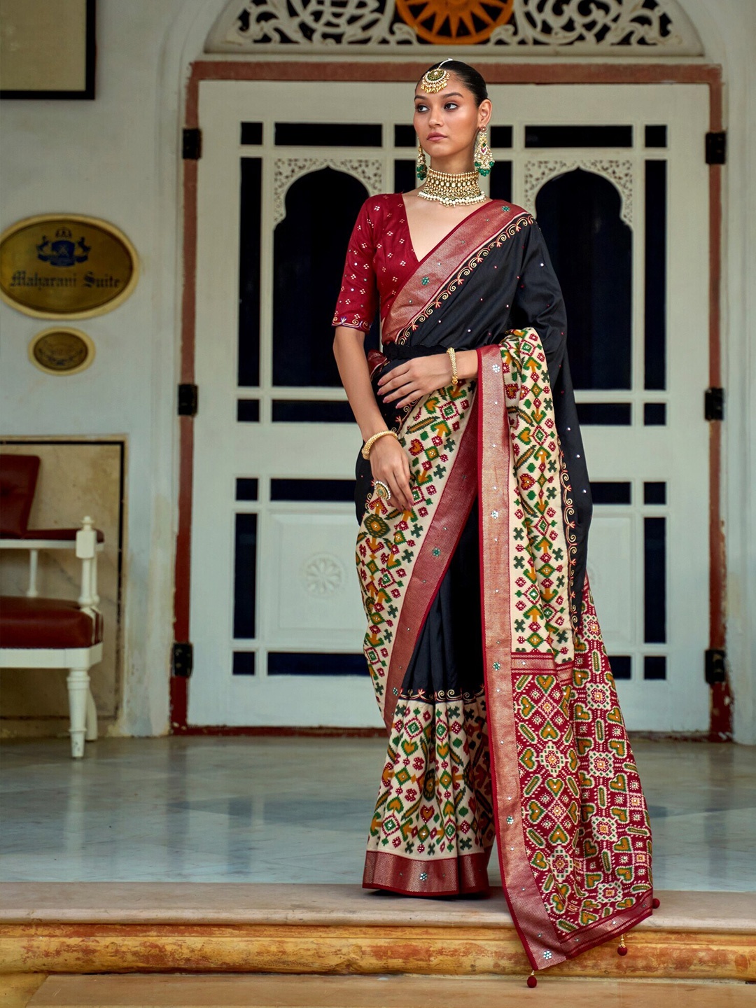 

Mitera Embellished Ethnic Motif Silk Blend Patola Saree, Black