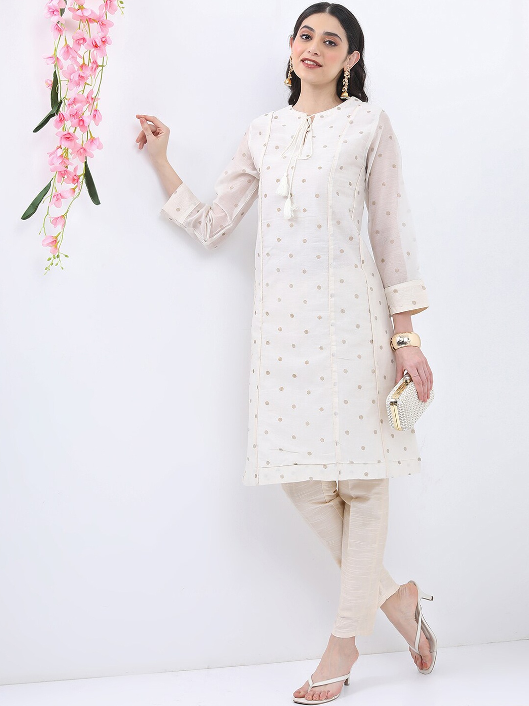 

Vishudh Polka Dots Printed Tie-Up Neck Regular Kurta With Trousers, Cream