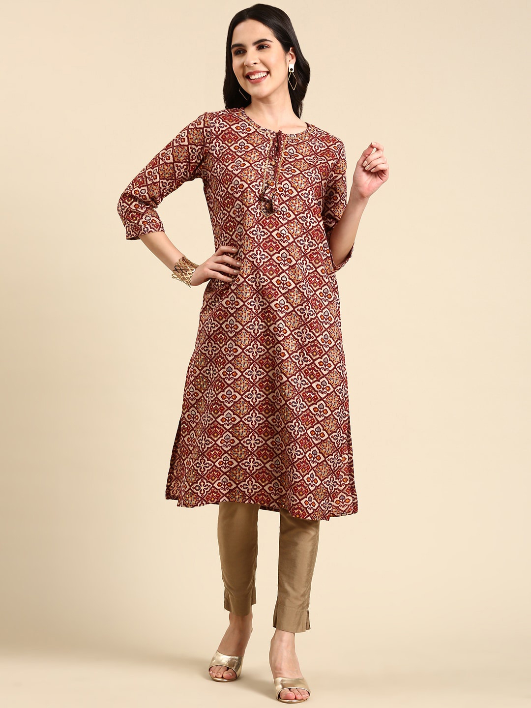 

SHOWOFF Ethnic Motifs Printed Tie-Up Neck Pleated A-Line Kurta, Maroon