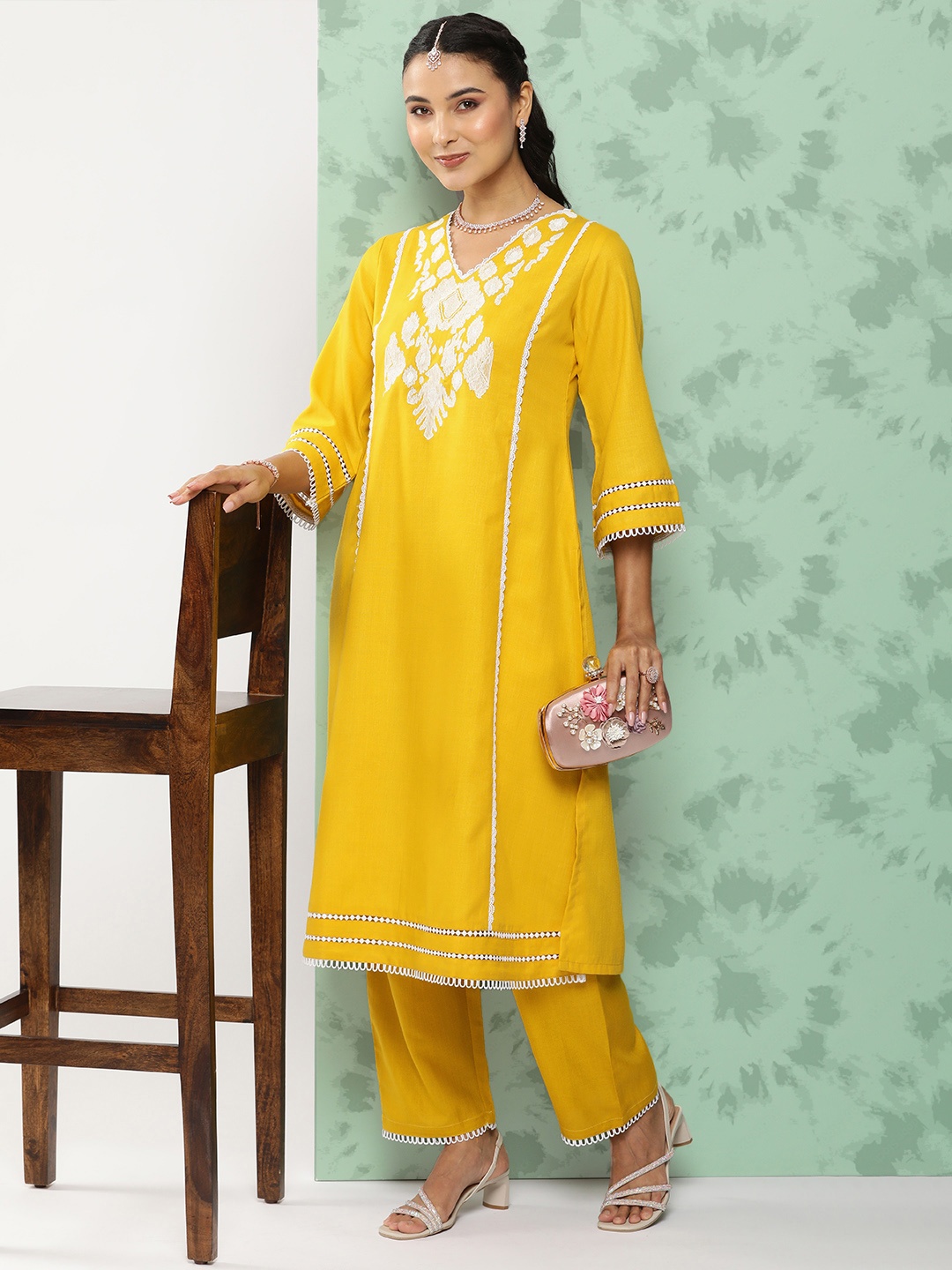 

Bhama Couture Women Ethnic Motifs Embroidered Regular Thread Work Kurta with Palazzos, Mustard